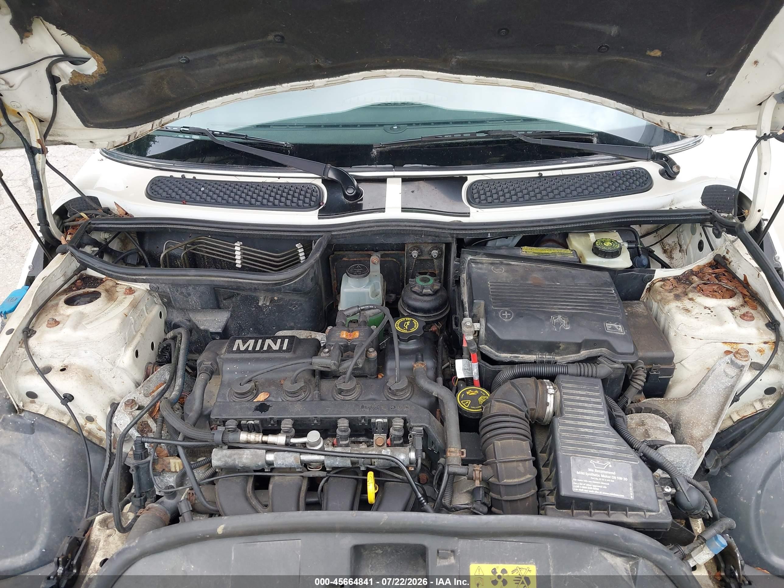 2005 Mini Cooper   Cream vin: WMWRC33455TC59491