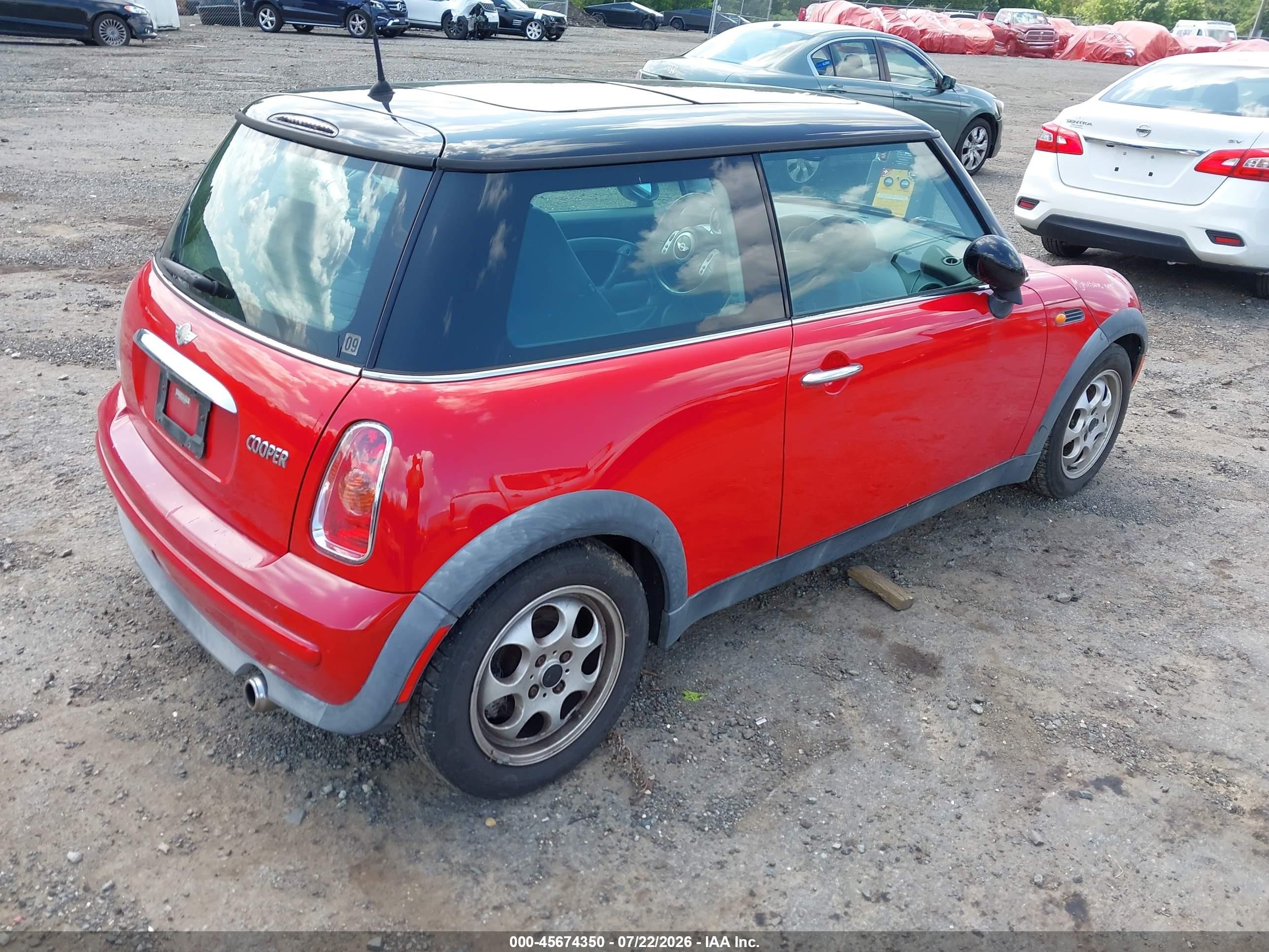 2002 Mini Cooper   Red vin: WMWRC33492TE12448