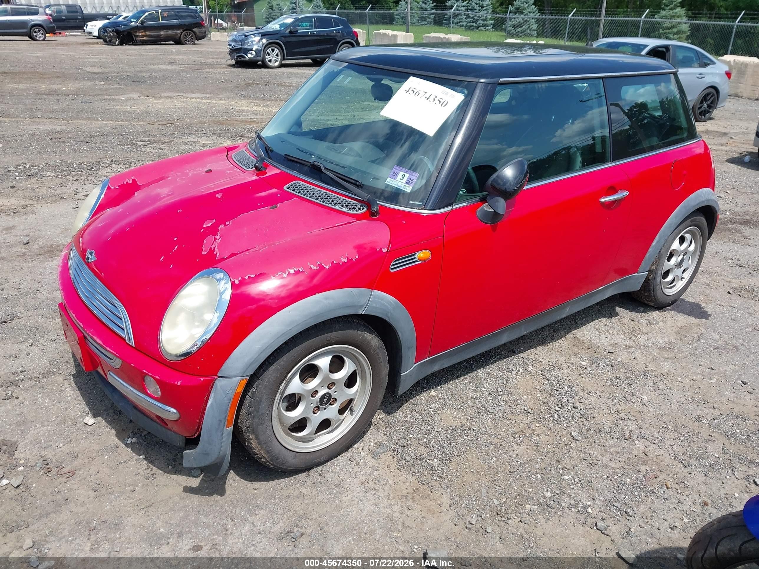 2002 Mini Cooper   Red vin: WMWRC33492TE12448