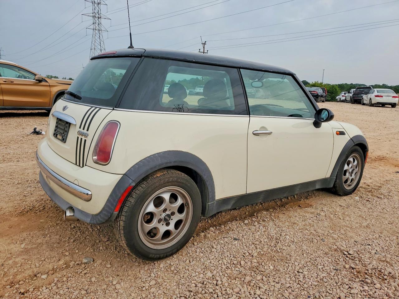 2003 Mini Cooper Cream vin: WMWRC334X3TE13318