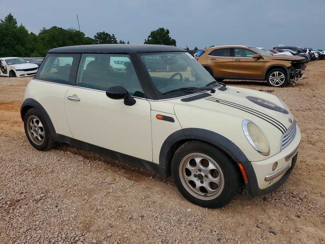 2003 Mini Cooper Cream vin: WMWRC334X3TE13318