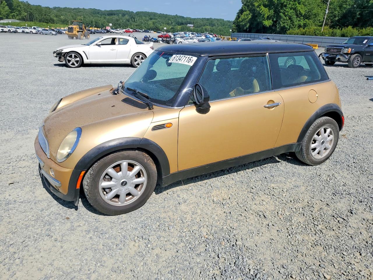 2004 Mini Cooper Gold vin: WMWRC334X4TJ53338
