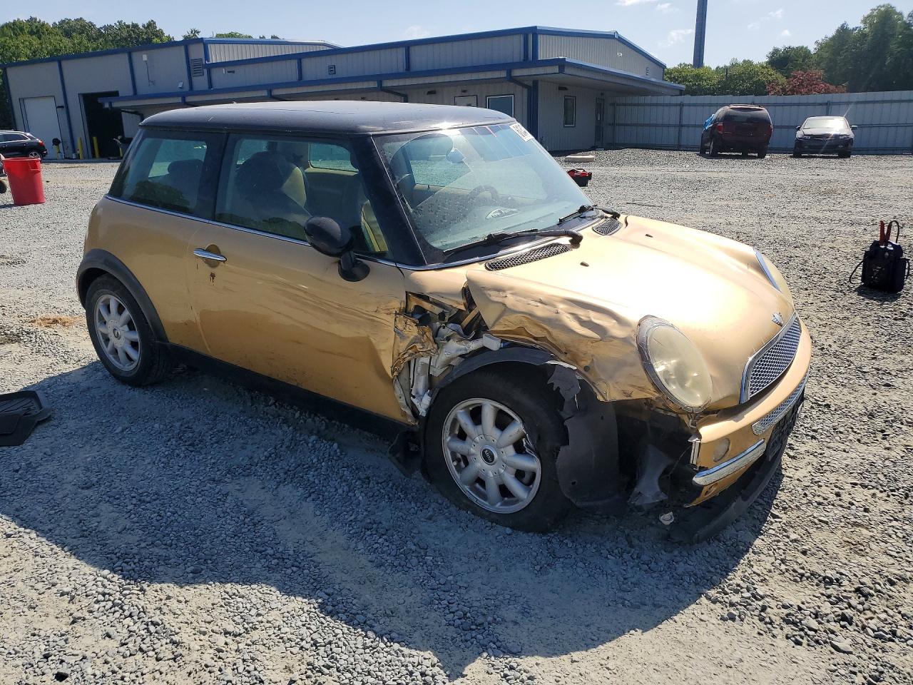 2004 Mini Cooper Gold vin: WMWRC334X4TJ53338