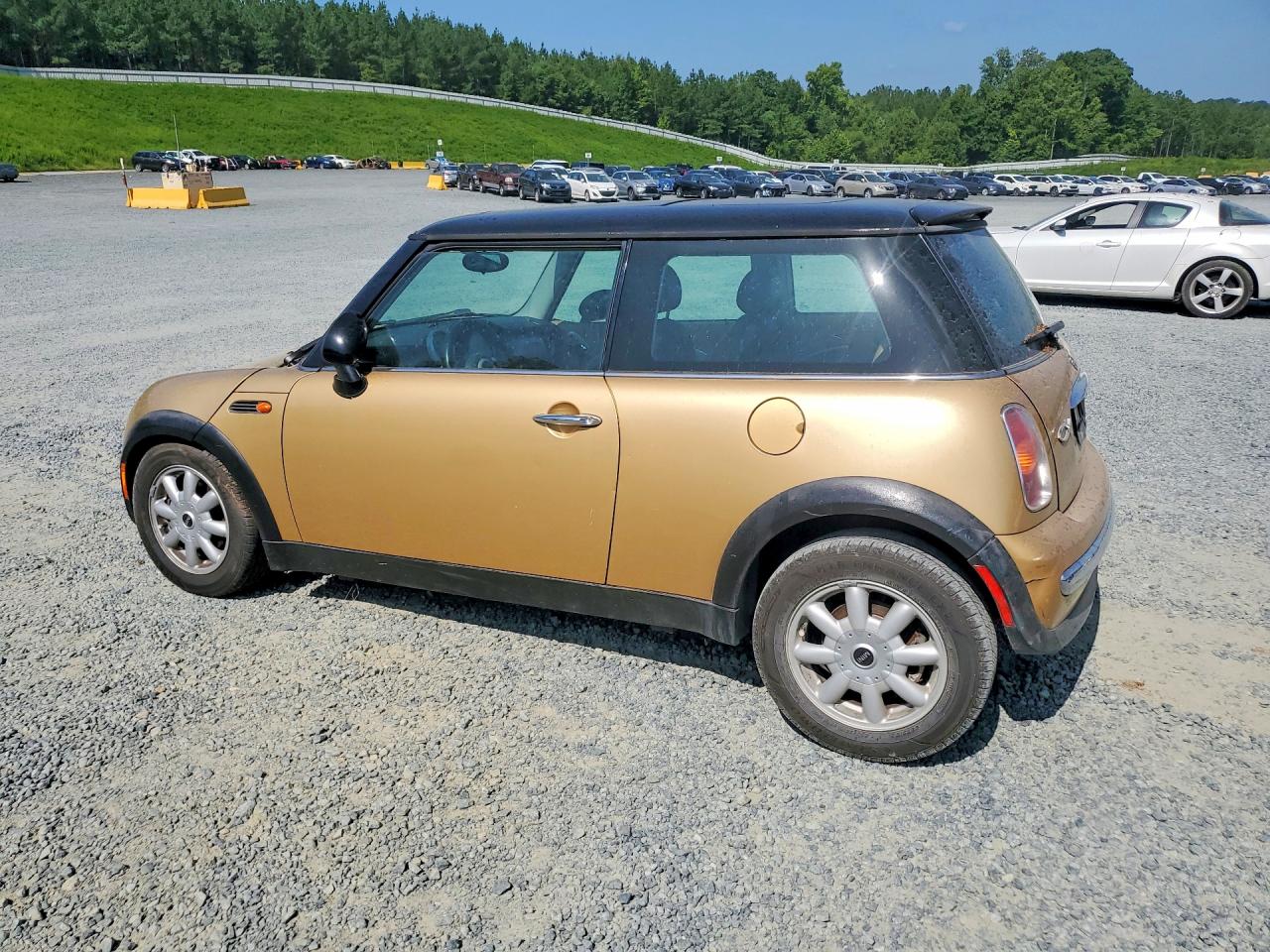 2004 Mini Cooper Gold vin: WMWRC334X4TJ53338