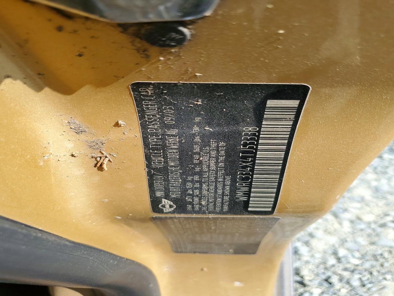 2004 Mini Cooper Gold vin: WMWRC334X4TJ53338