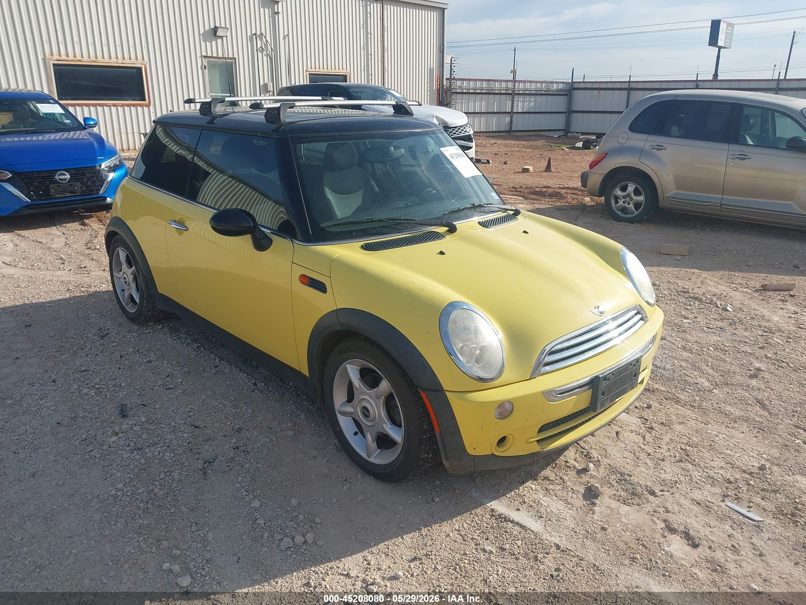 2005 Mini Cooper   Yellow vin: WMWRC33505TK61557