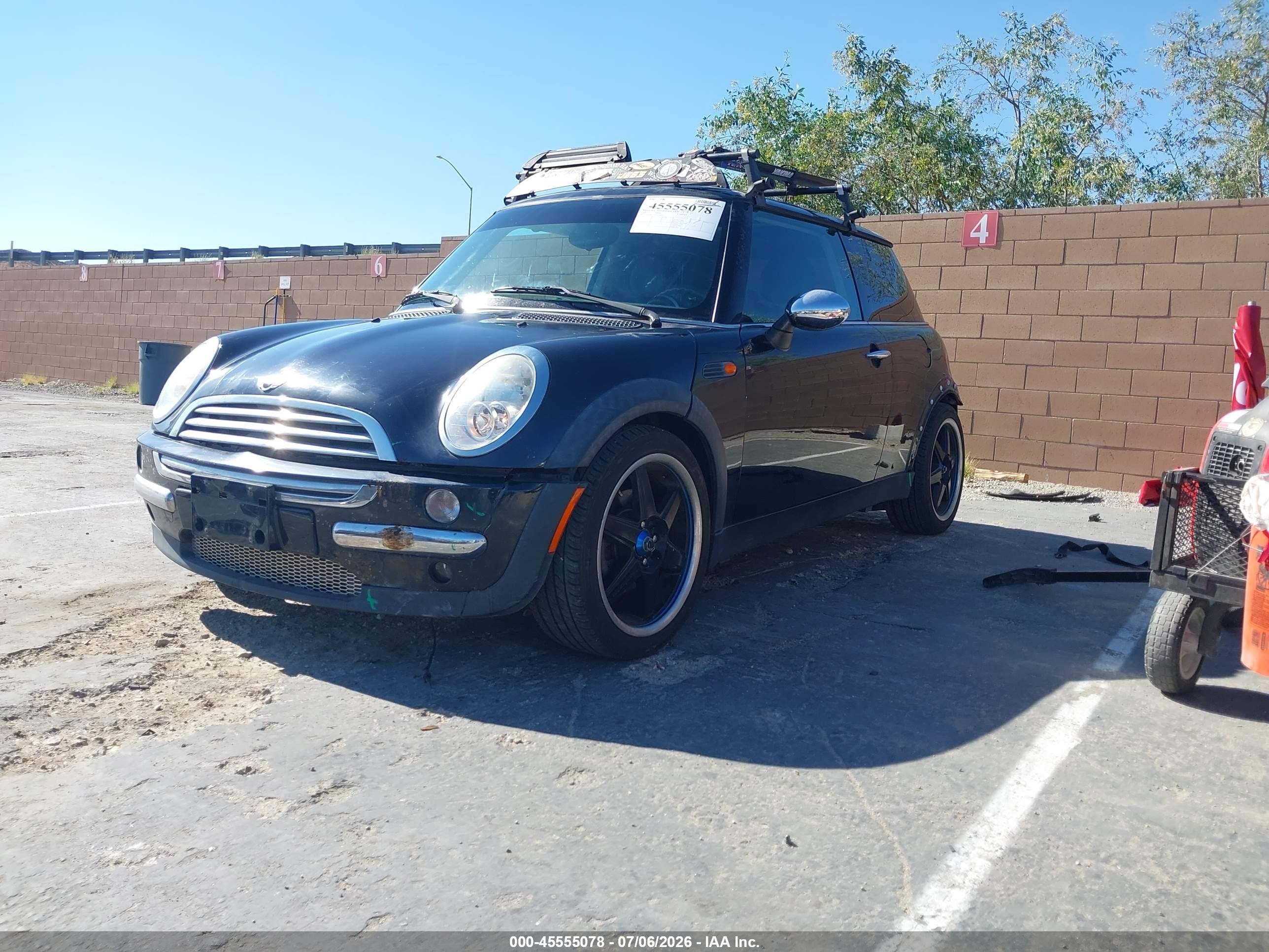 2006 Mini Cooper   Black vin: WMWRC33526TJ78696