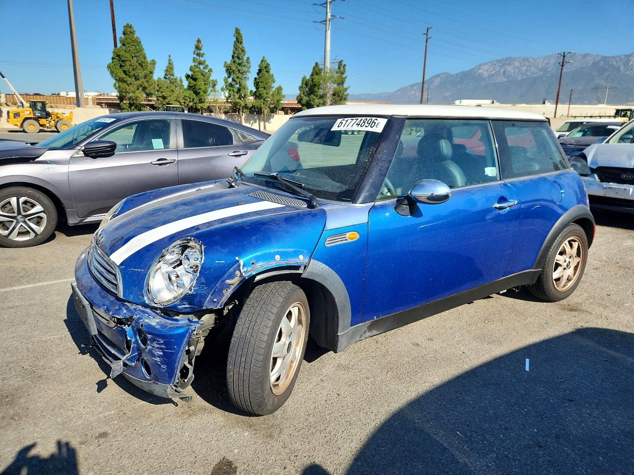 2006 Mini Cooper Blue vin: WMWRC33526TK17402