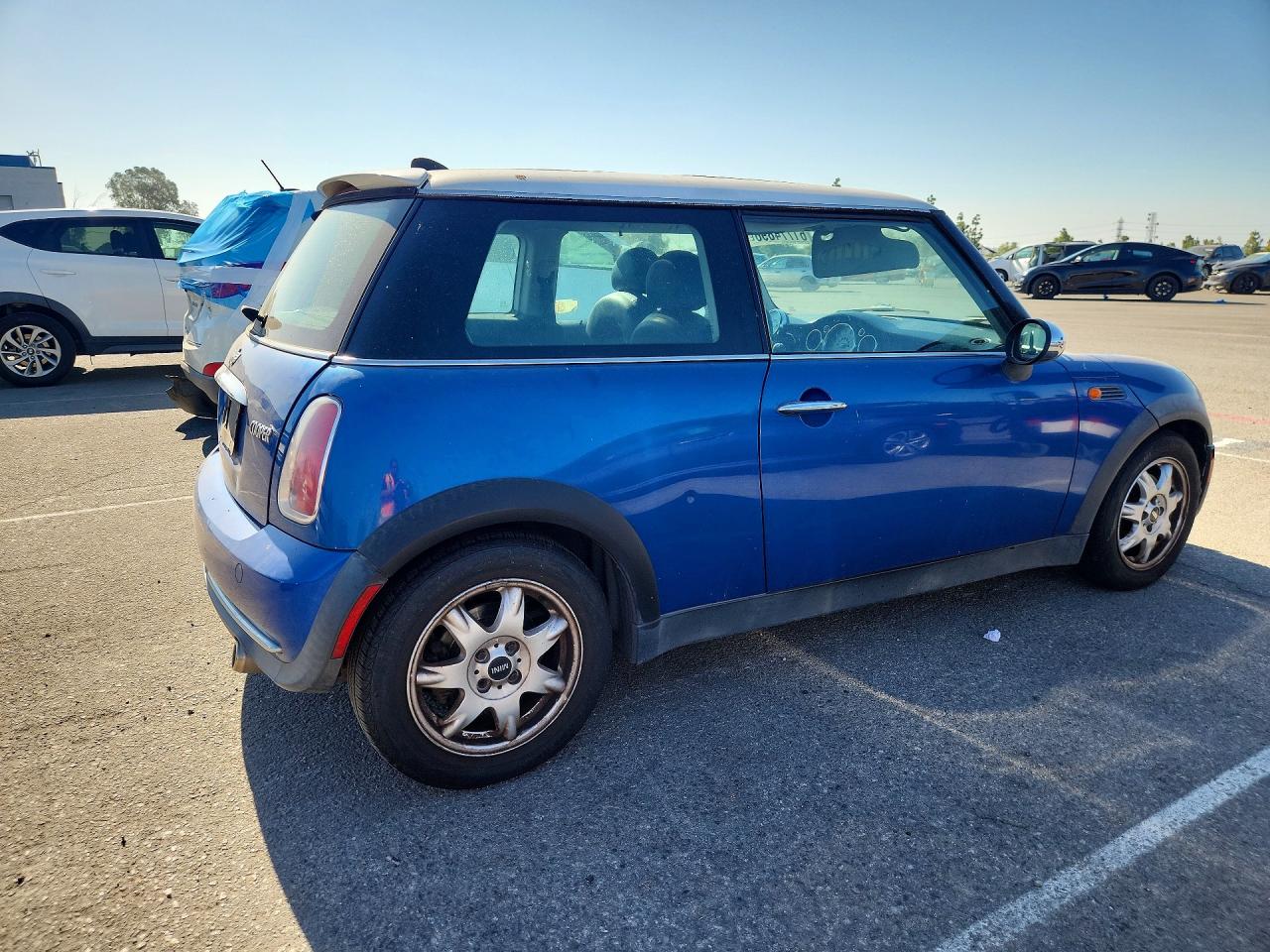 2006 Mini Cooper Blue vin: WMWRC33526TK17402