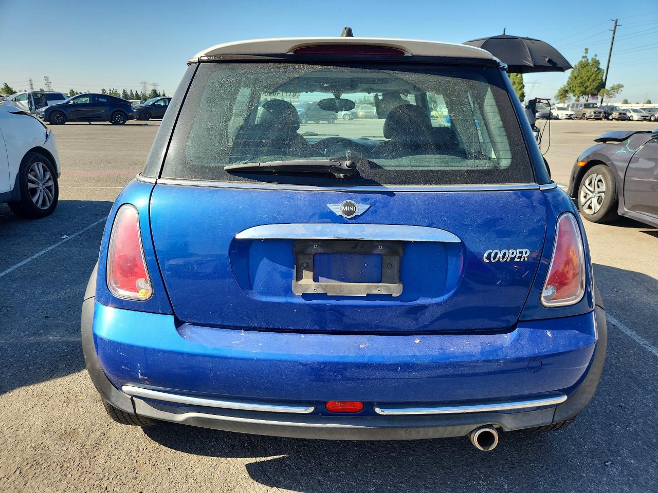 2006 Mini Cooper Blue vin: WMWRC33526TK17402