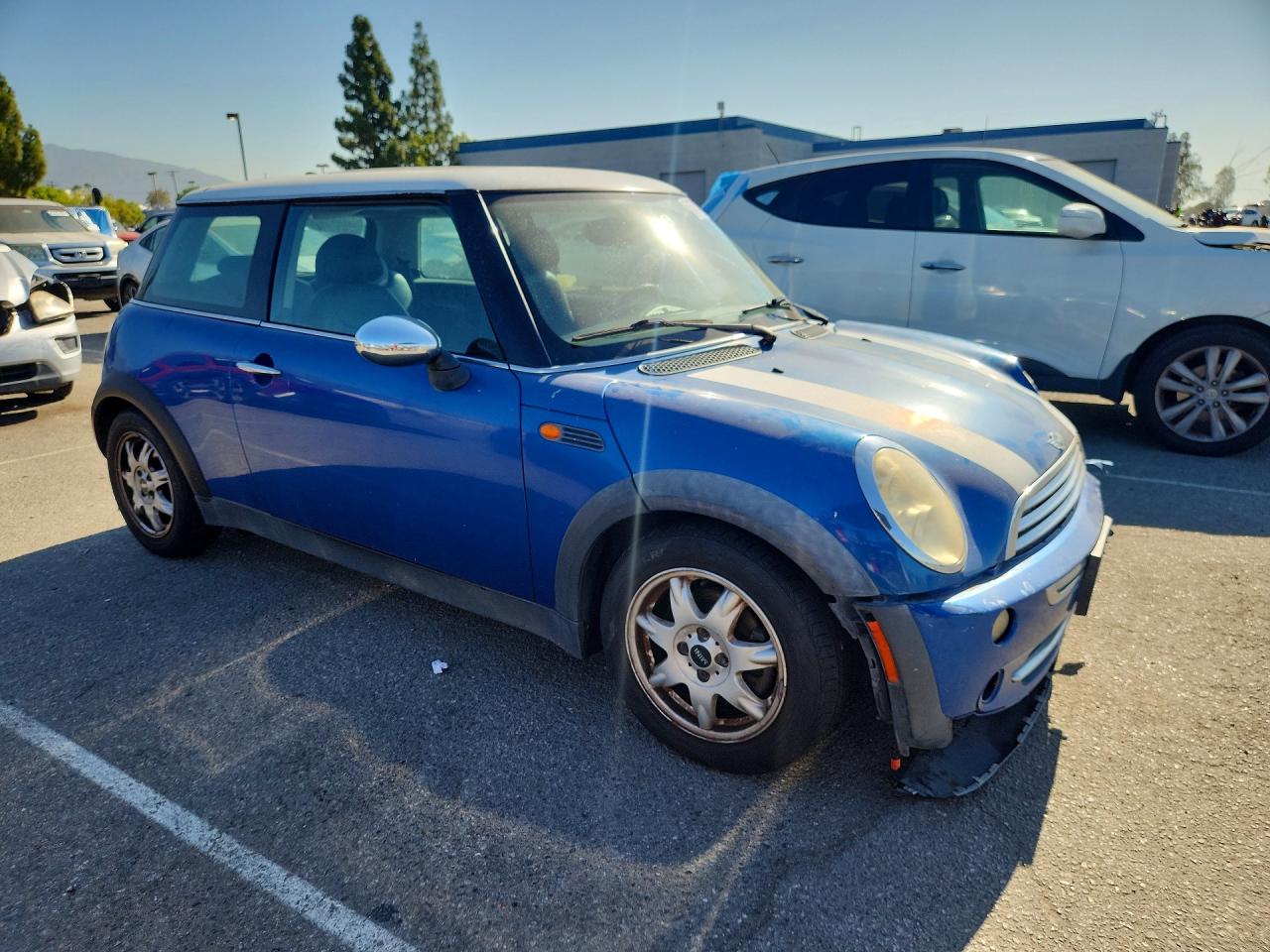 2006 Mini Cooper Blue vin: WMWRC33526TK17402