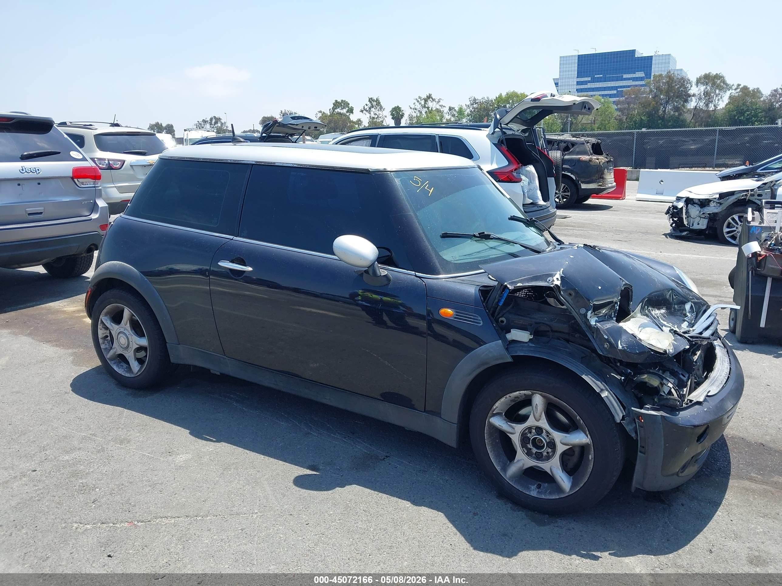 2006 Mini Cooper   Black vin: WMWRC33526TK17898