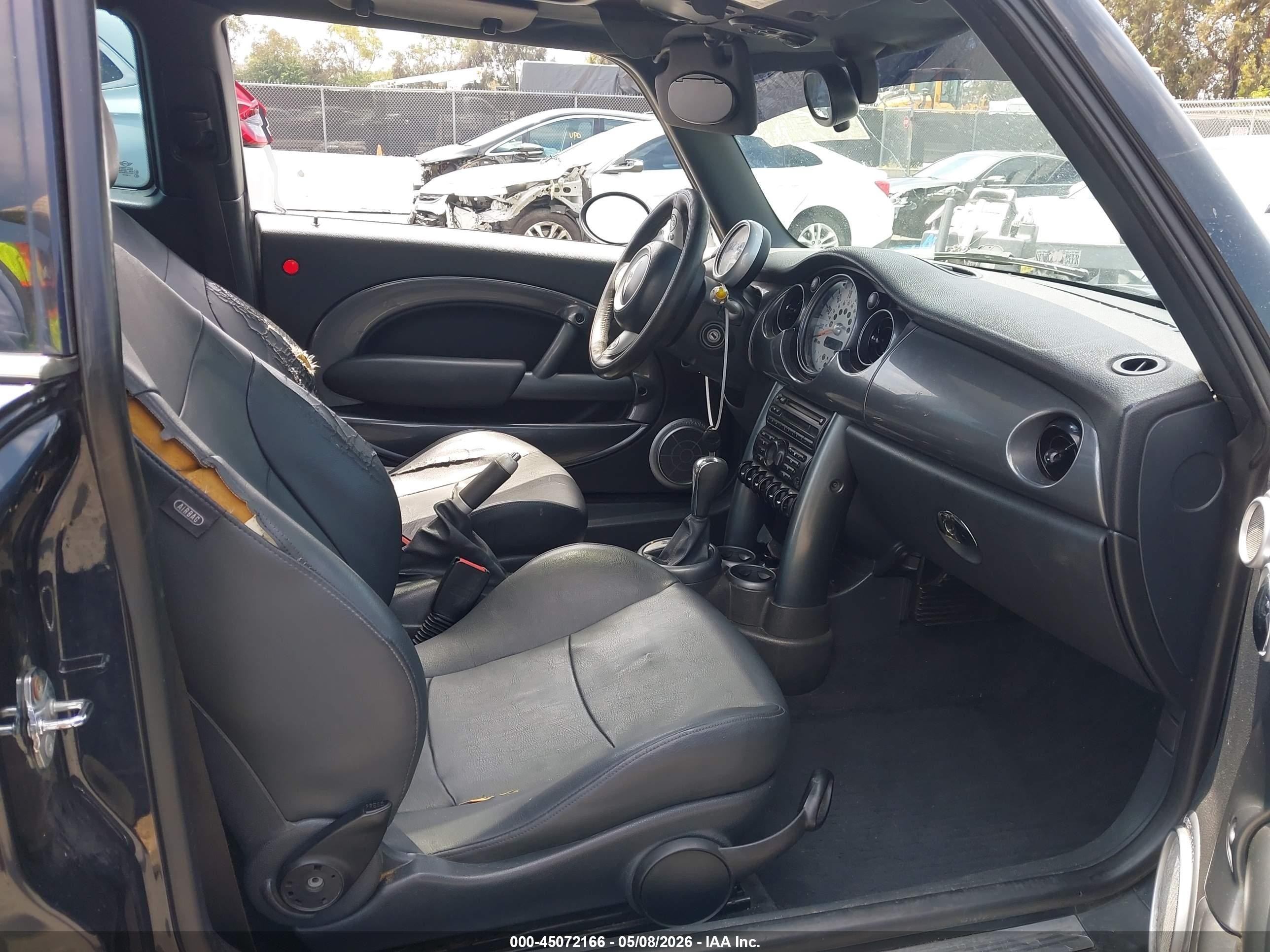 2006 Mini Cooper   Black vin: WMWRC33526TK17898