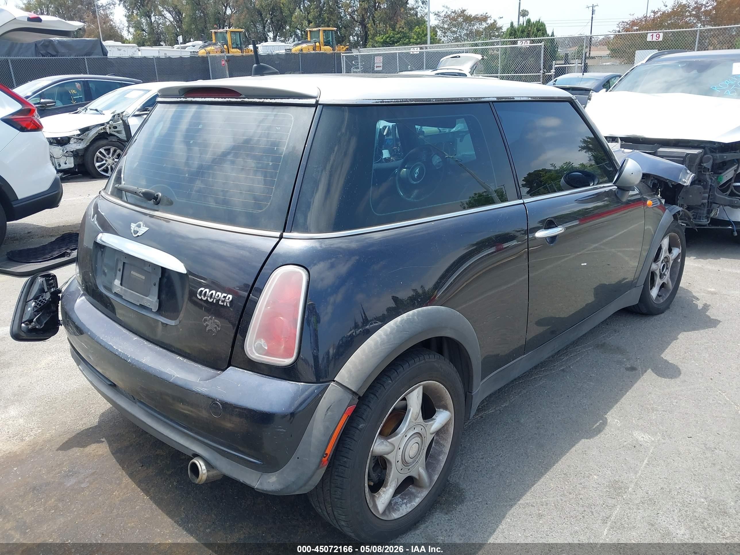 2006 Mini Cooper   Black vin: WMWRC33526TK17898