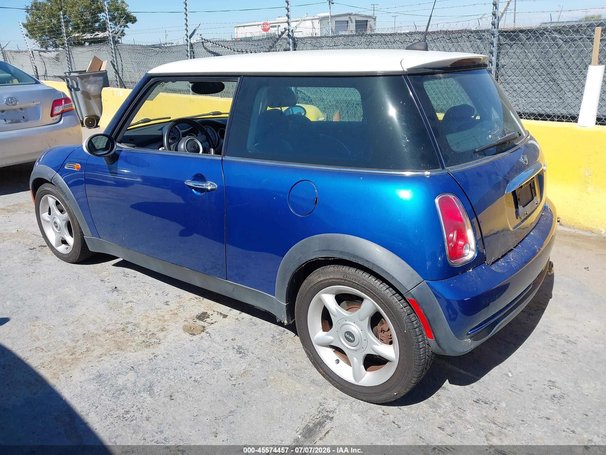 2006 Mini Cooper   Blue vin: WMWRC33526TK17951