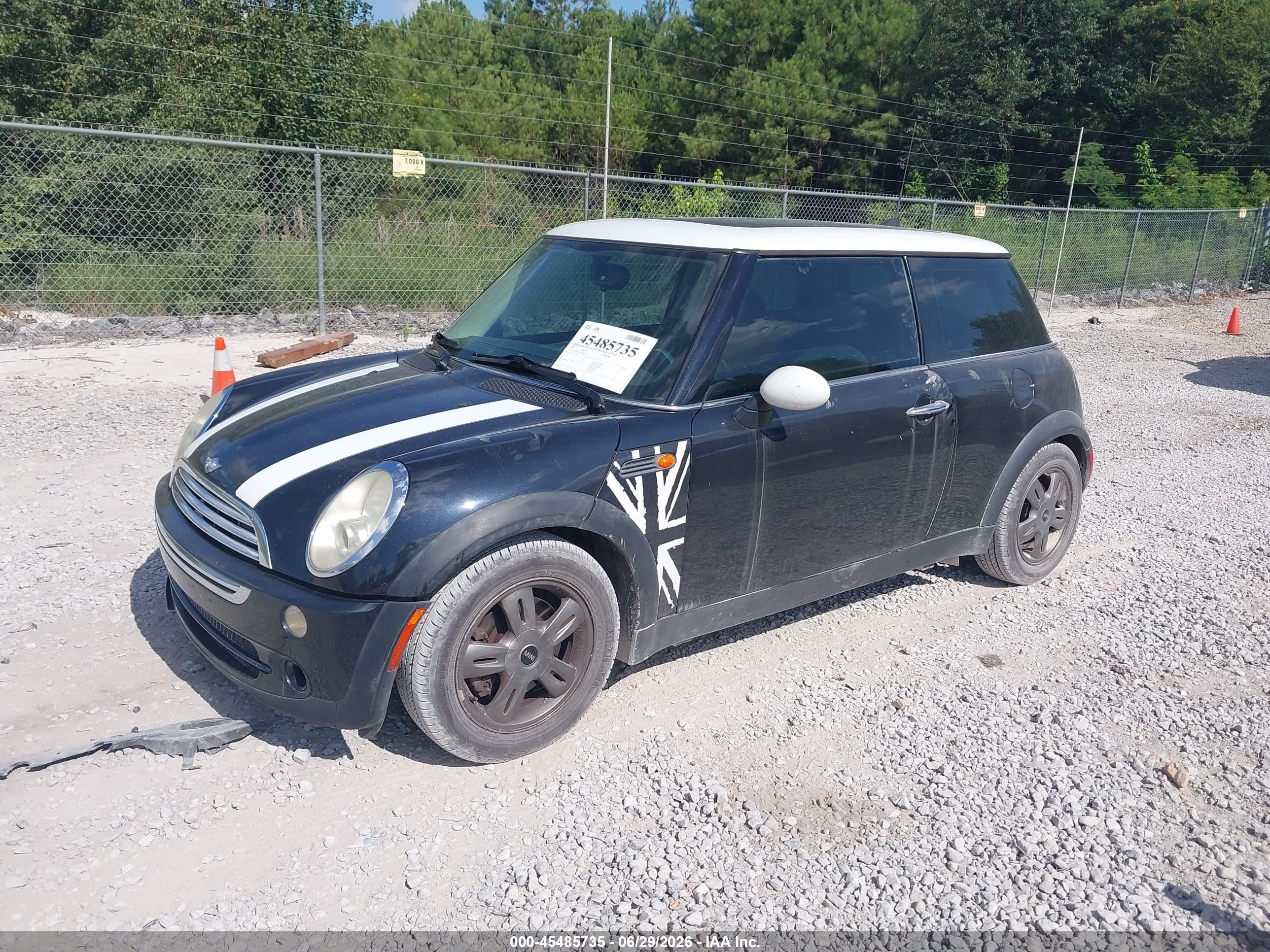 2006 Mini Cooper   Black vin: WMWRC33596TK65723