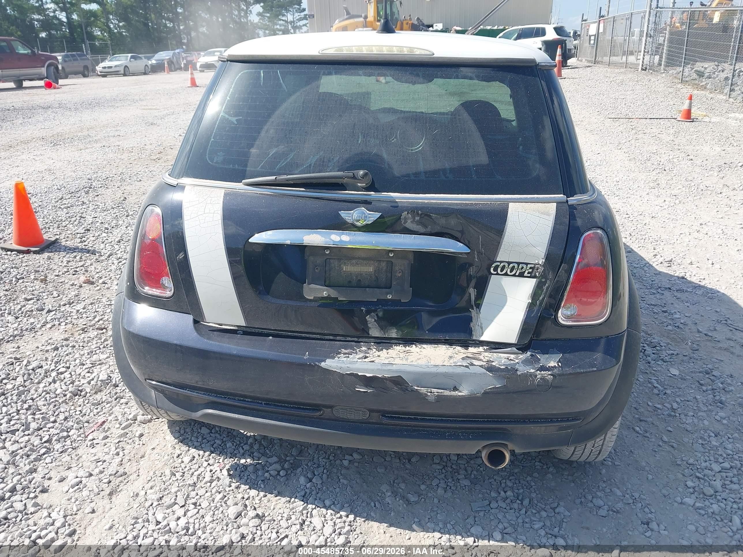 2006 Mini Cooper   Black vin: WMWRC33596TK65723