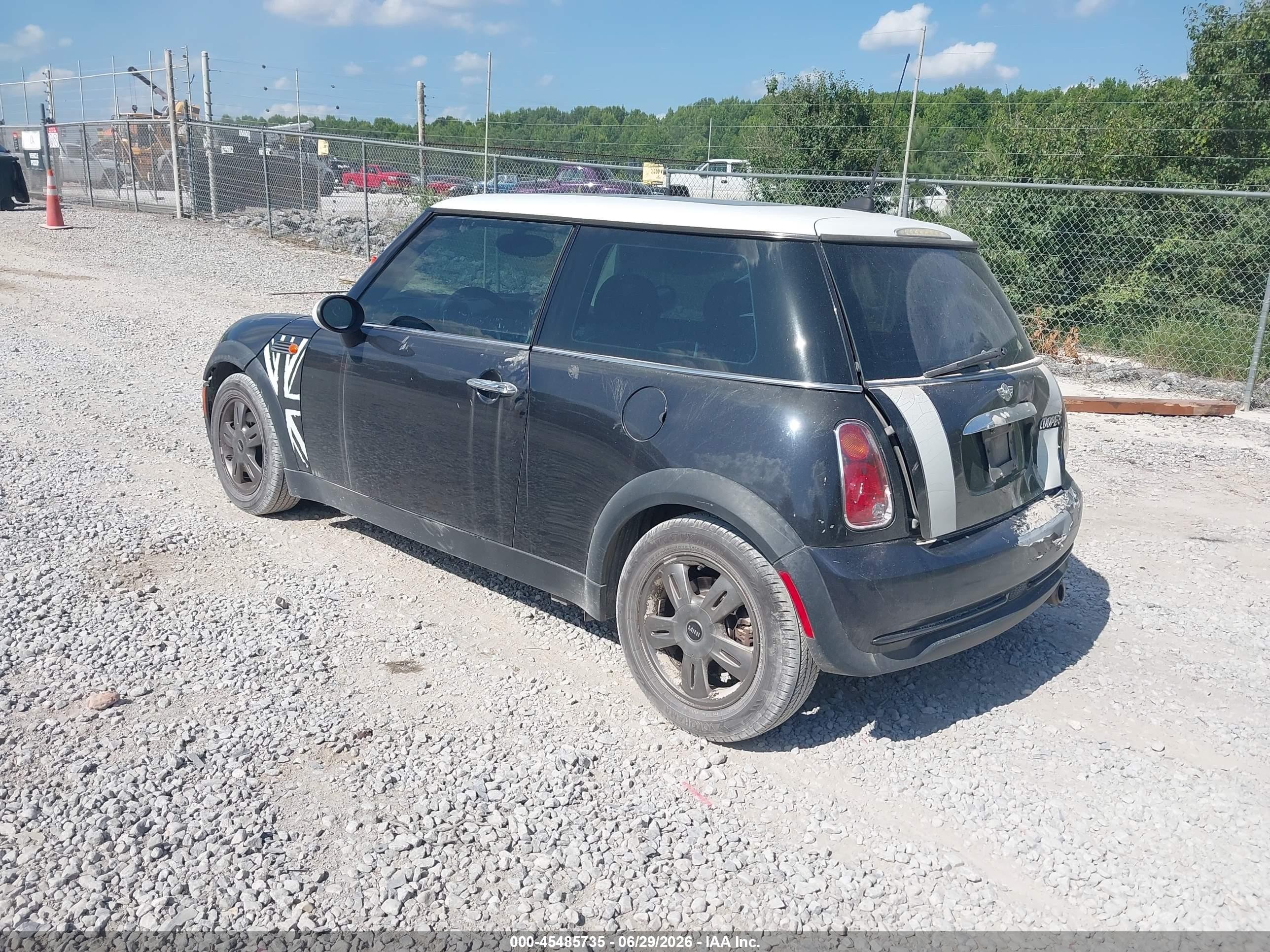 2006 Mini Cooper   Black vin: WMWRC33596TK65723