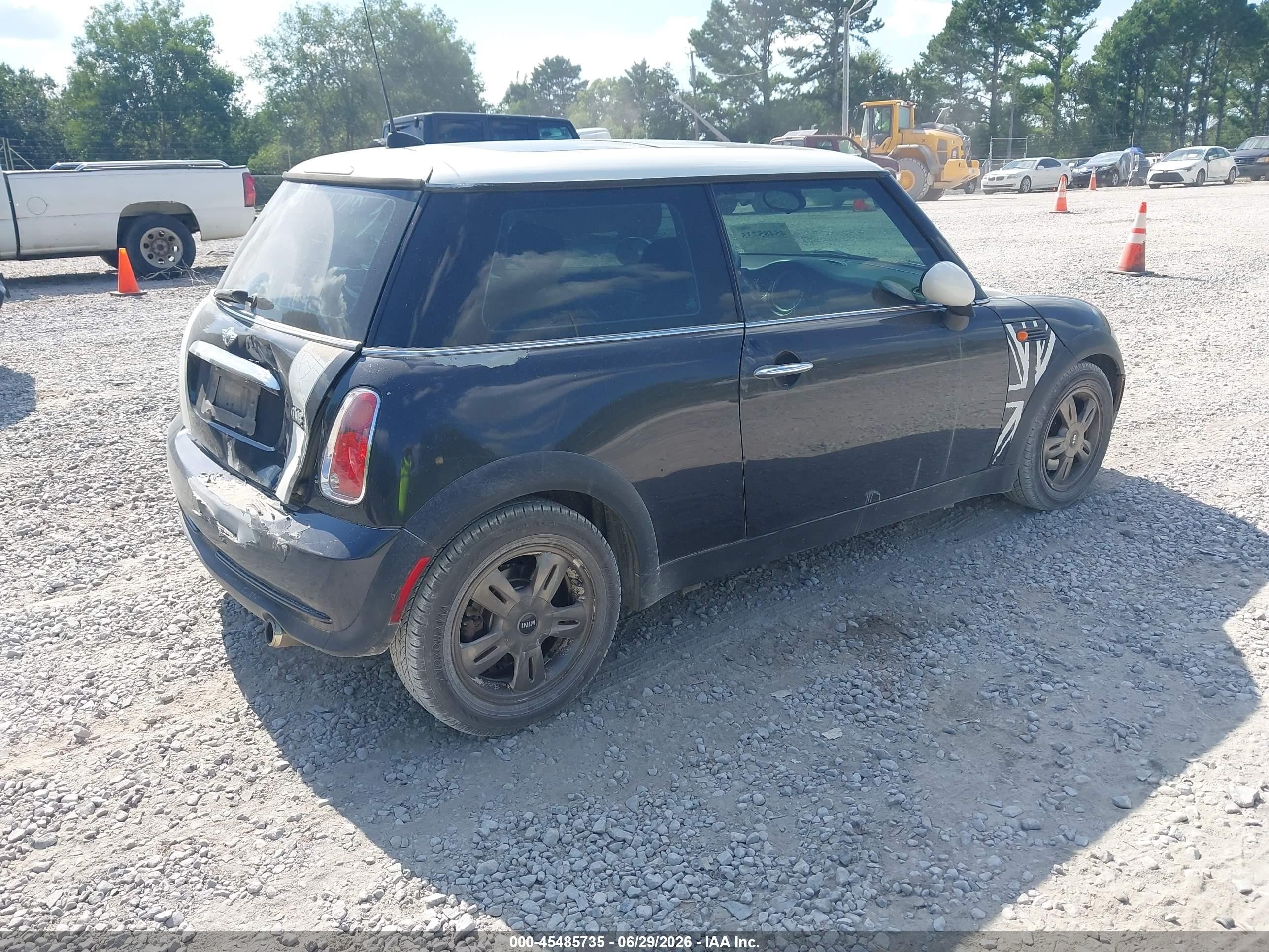 2006 Mini Cooper   Black vin: WMWRC33596TK65723