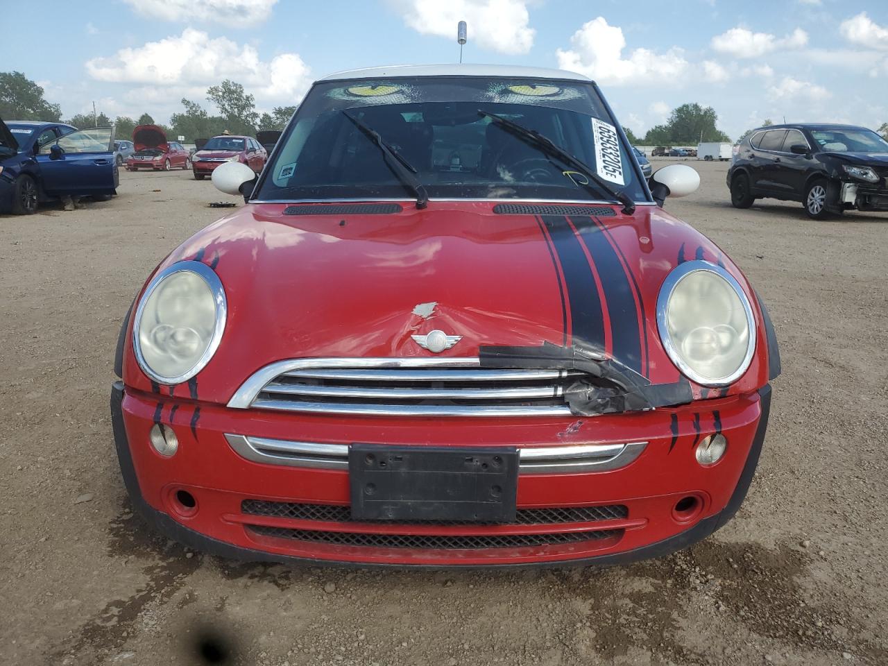 2006 Mini Cooper Red vin: WMWRC33596TK70386