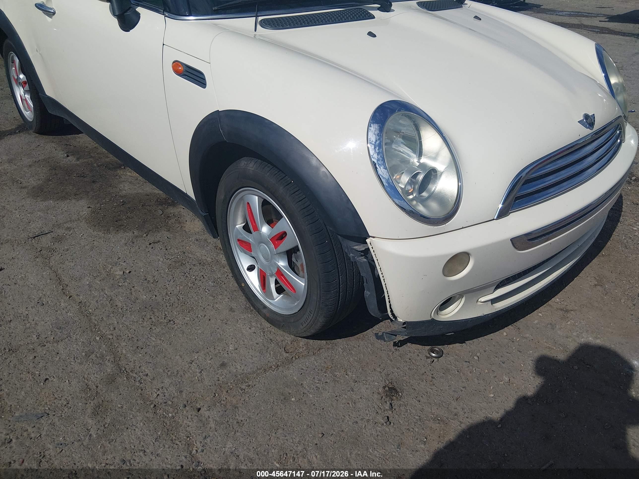 2006 Mini Cooper   White vin: WMWRC33596TK70548