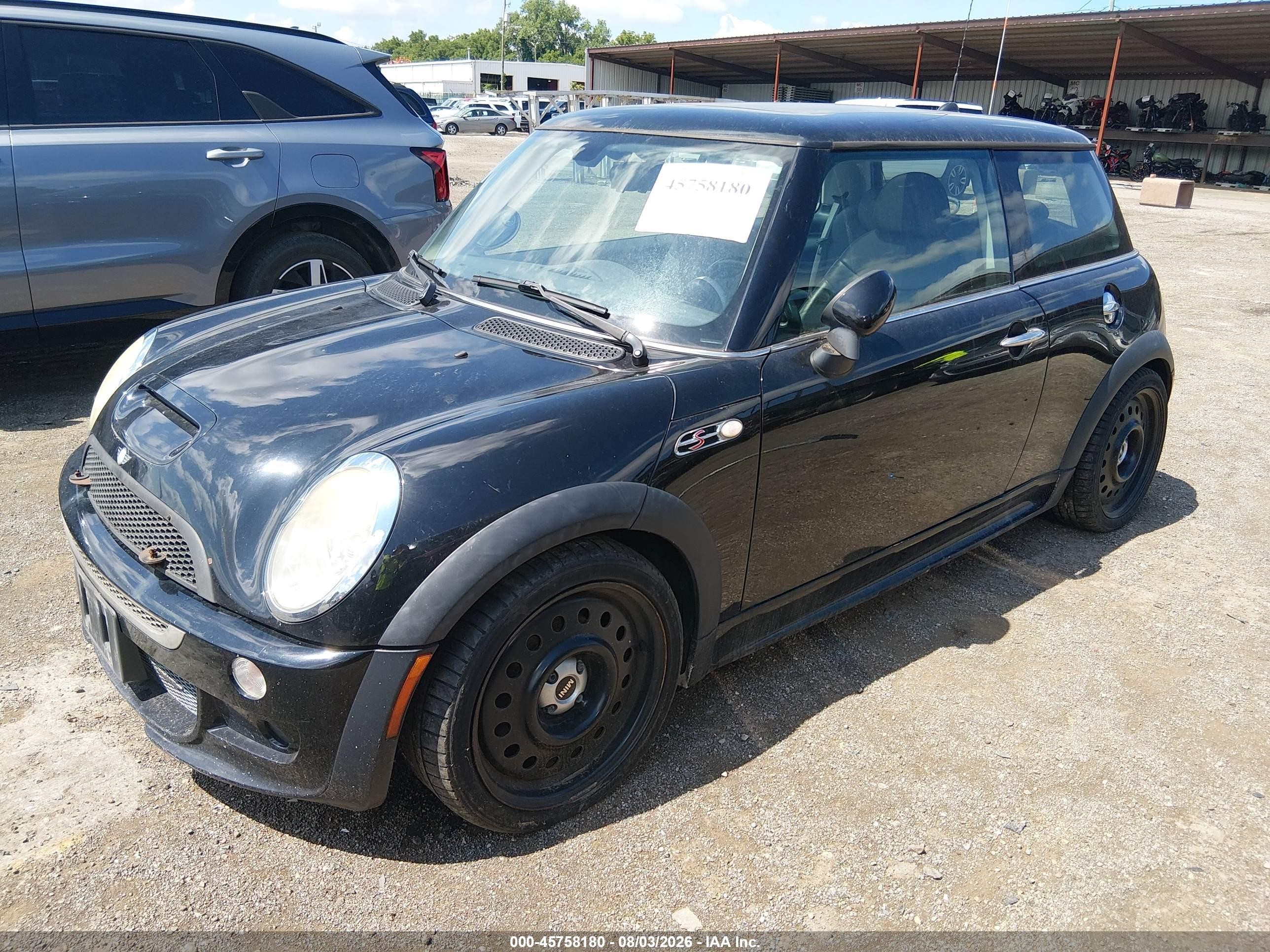 2004 Mini Cooper S   Black vin: WMWRE334X4TD79442