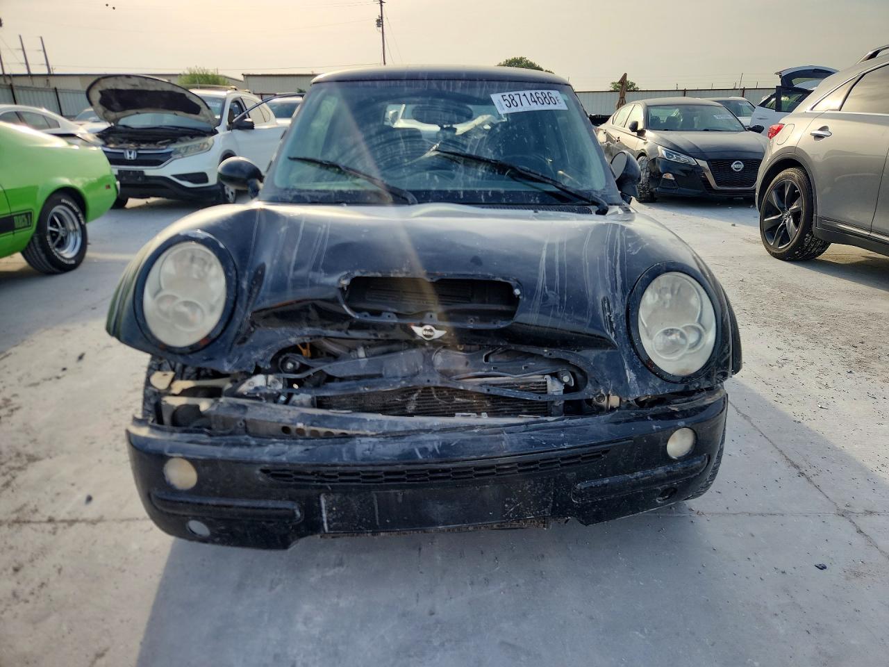 2006 Mini Cooper S Black vin: WMWRE33556TN25707