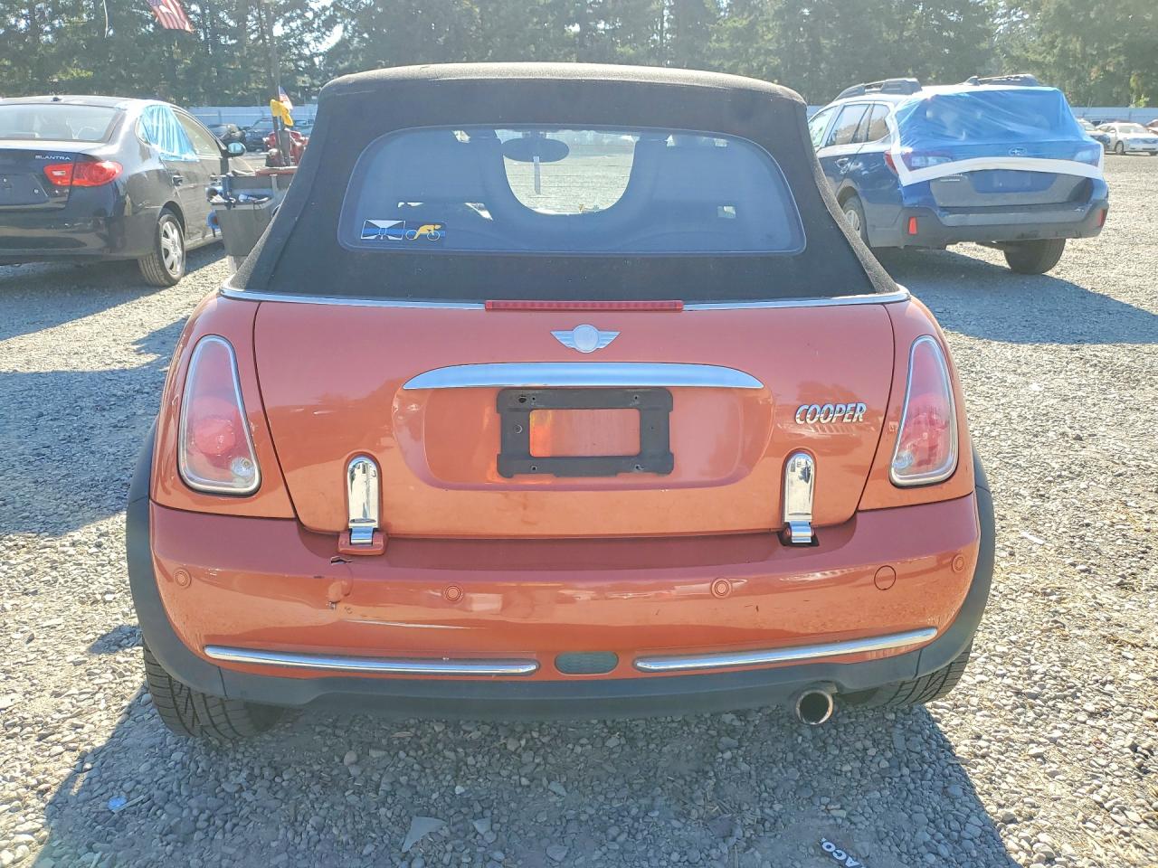 2005 Mini Cooper Orange vin: WMWRF33425TG10140