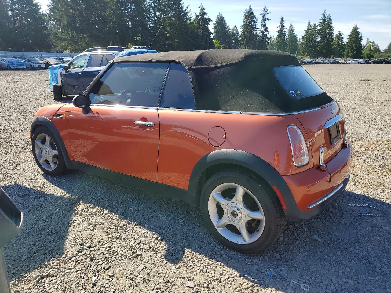 2005 Mini Cooper Orange vin: WMWRF33425TG10140