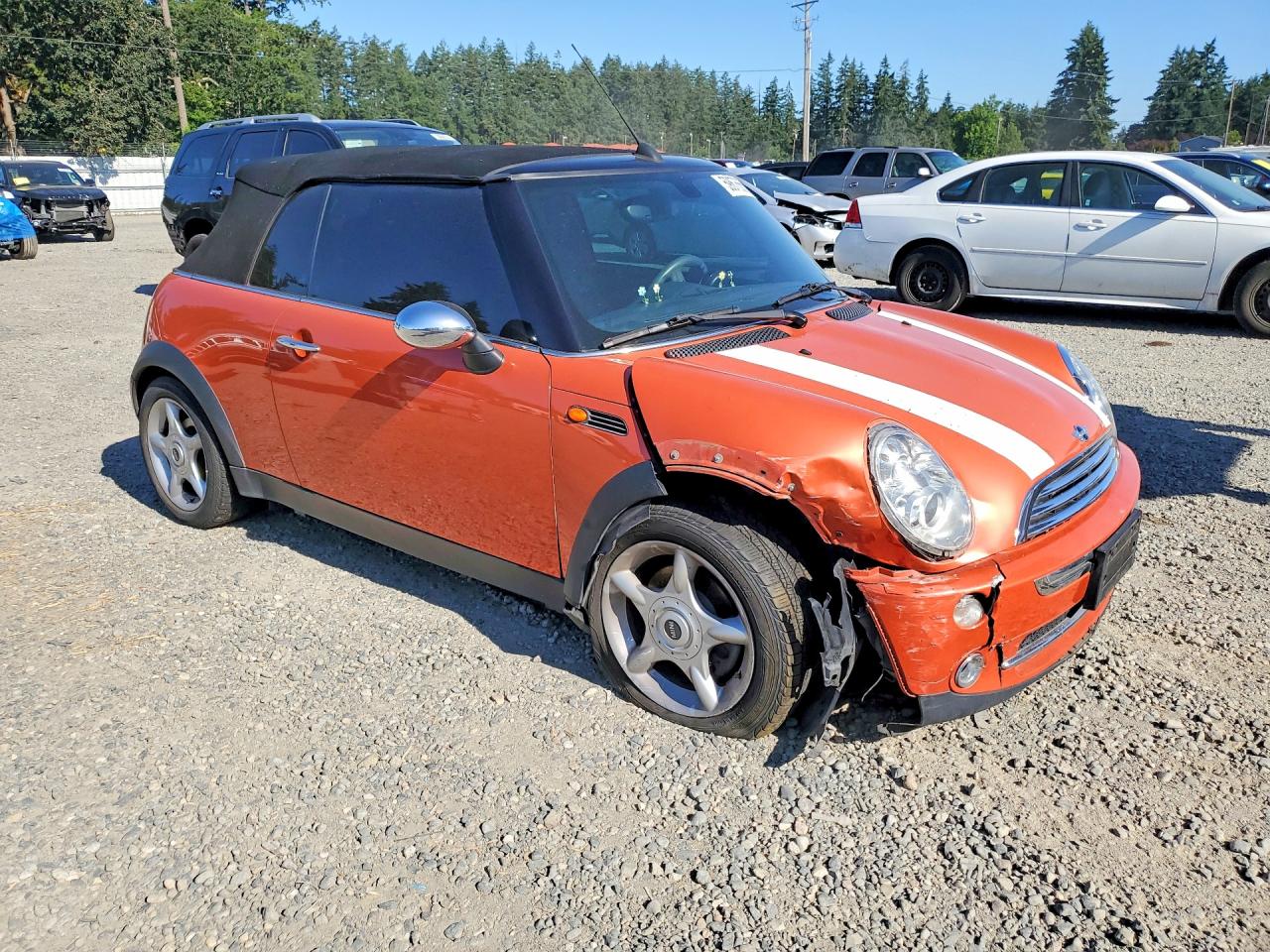 2005 Mini Cooper Orange vin: WMWRF33425TG10140