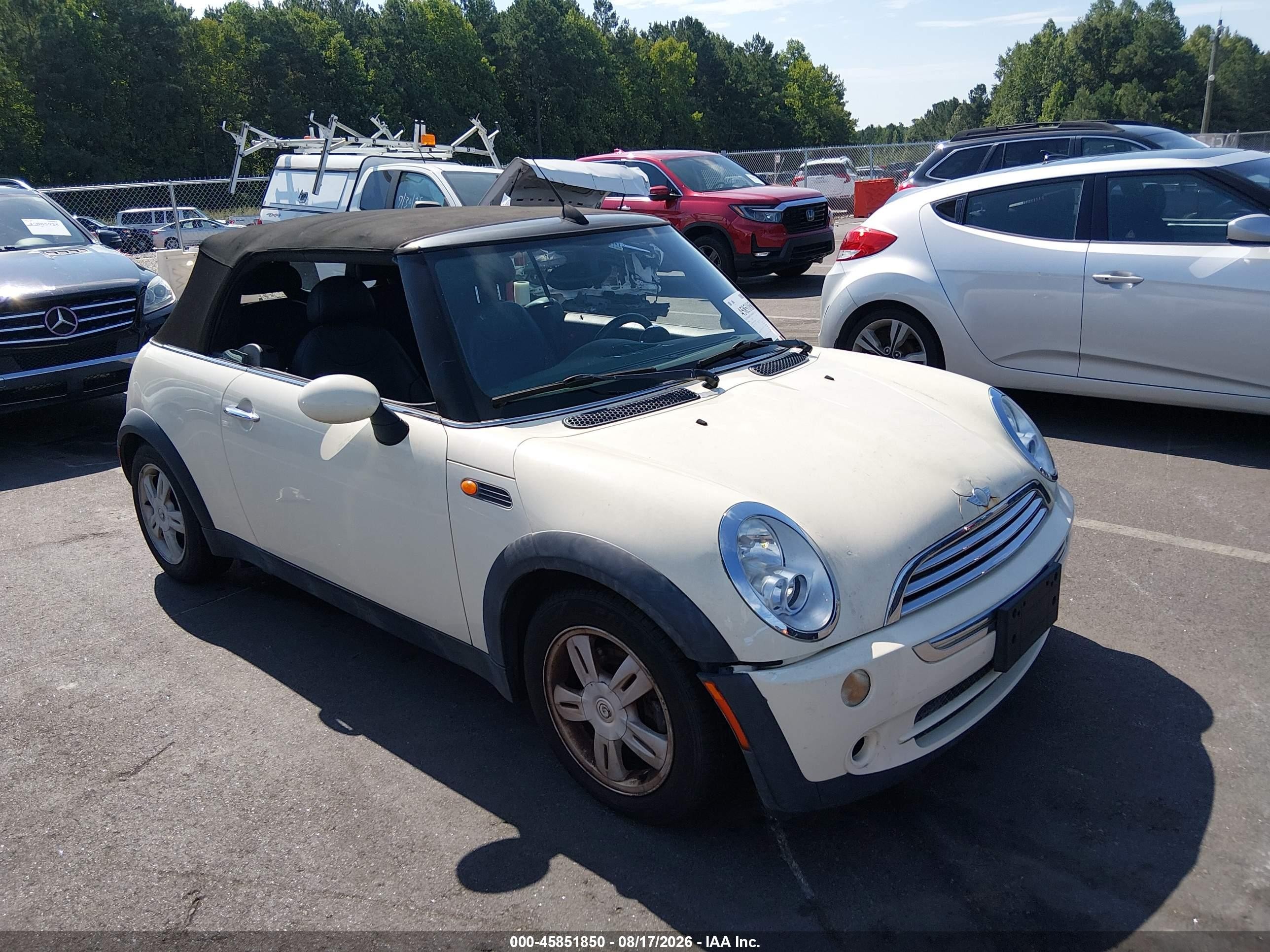 2006 Mini Cooper   White vin: WMWRF33556TG16041