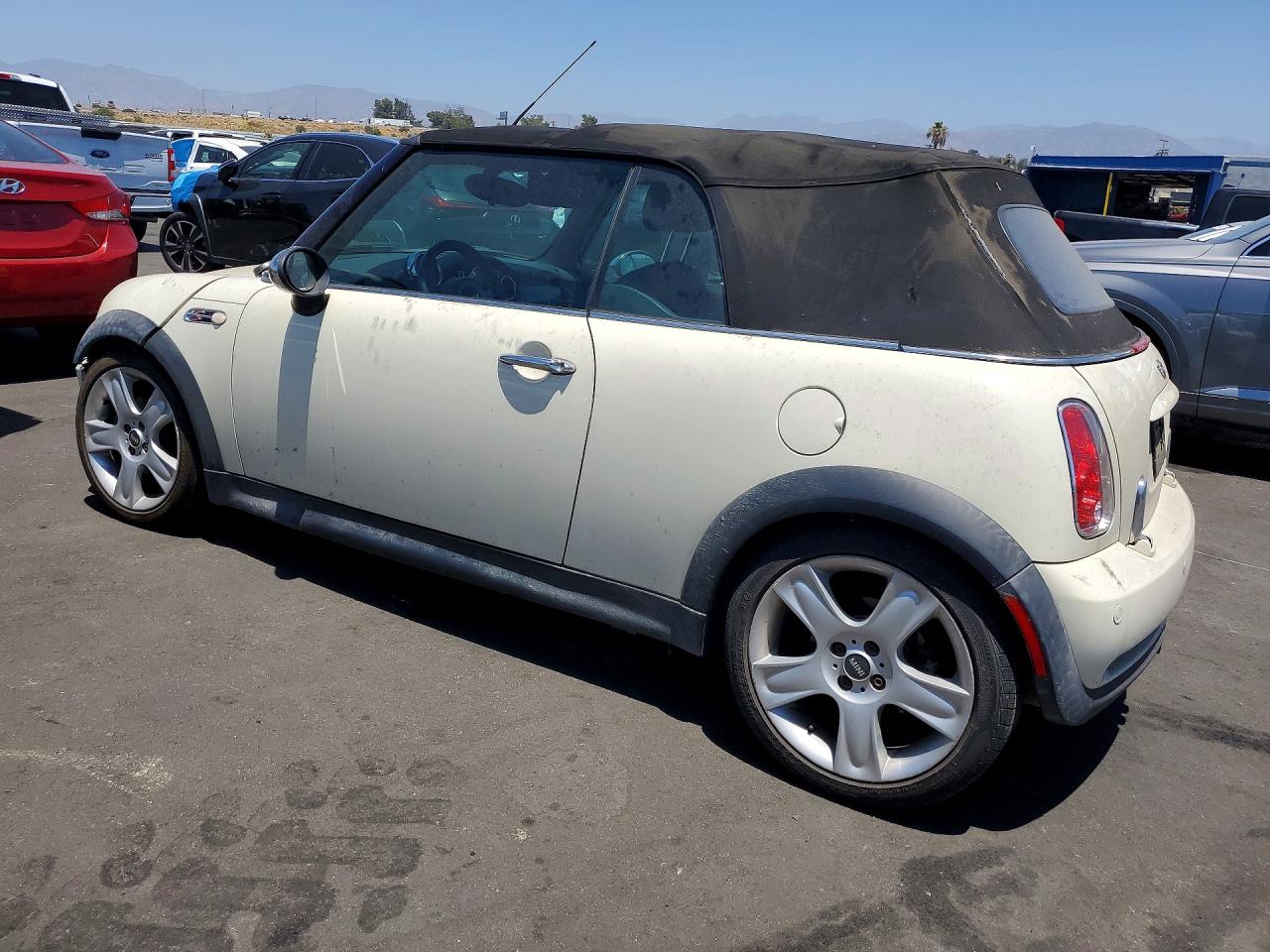 2006 Mini Cooper S Cream vin: WMWRH33566TF89054