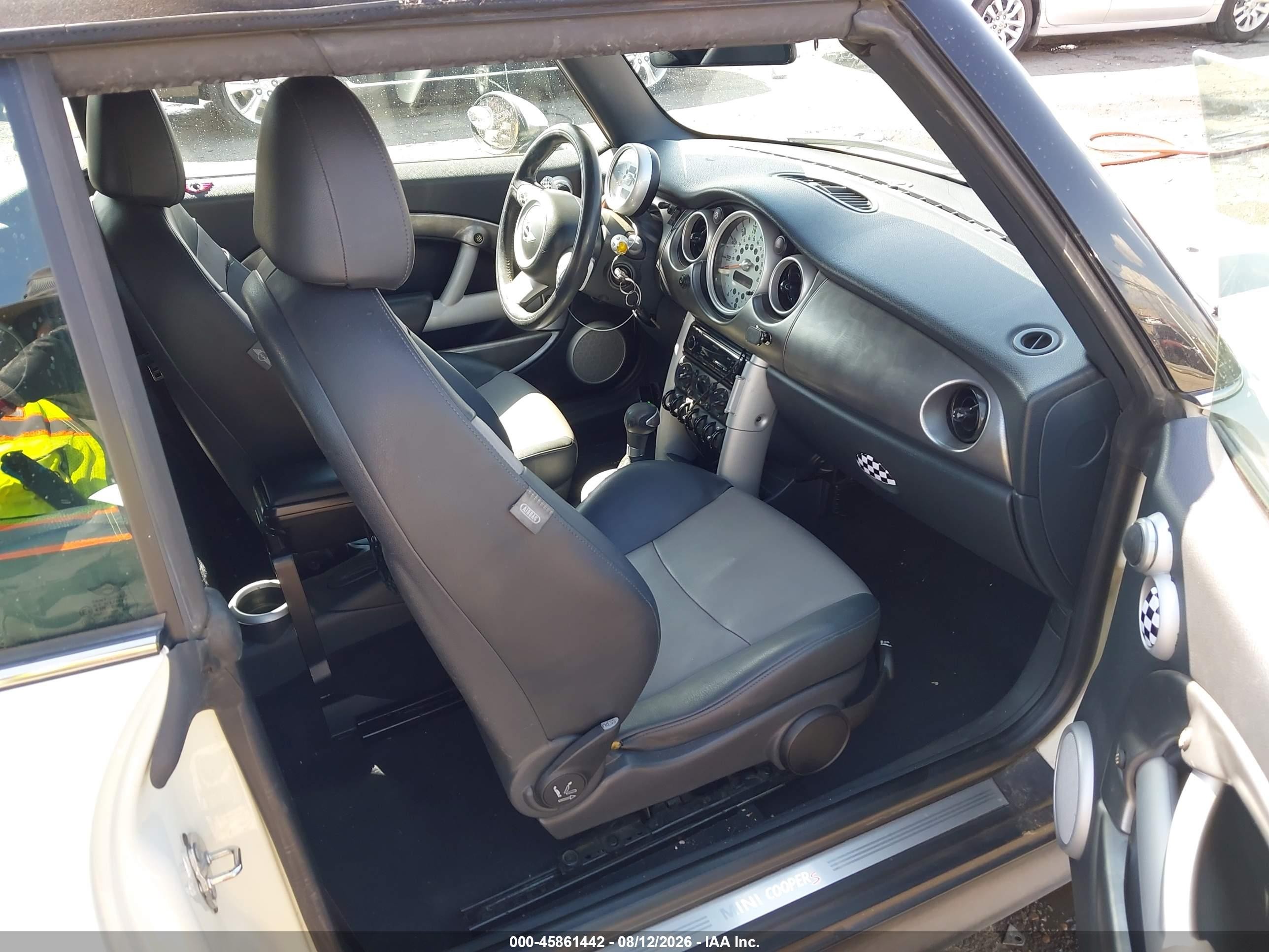 2006 Mini Cooper S   White vin: WMWRH33566TK59041