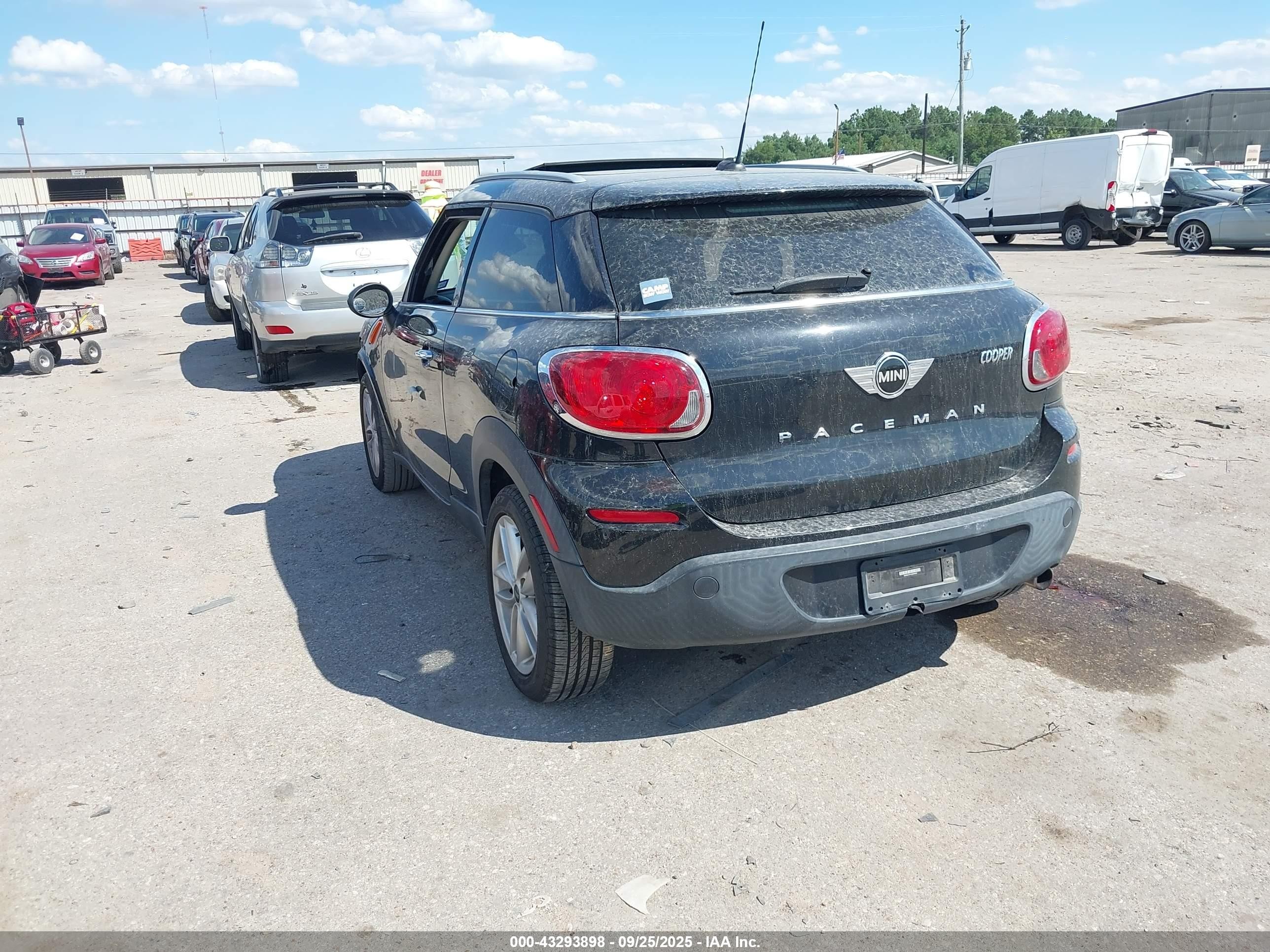 2014 Mini Paceman Cooper Black vin: WMWSS1C51EWN94633
