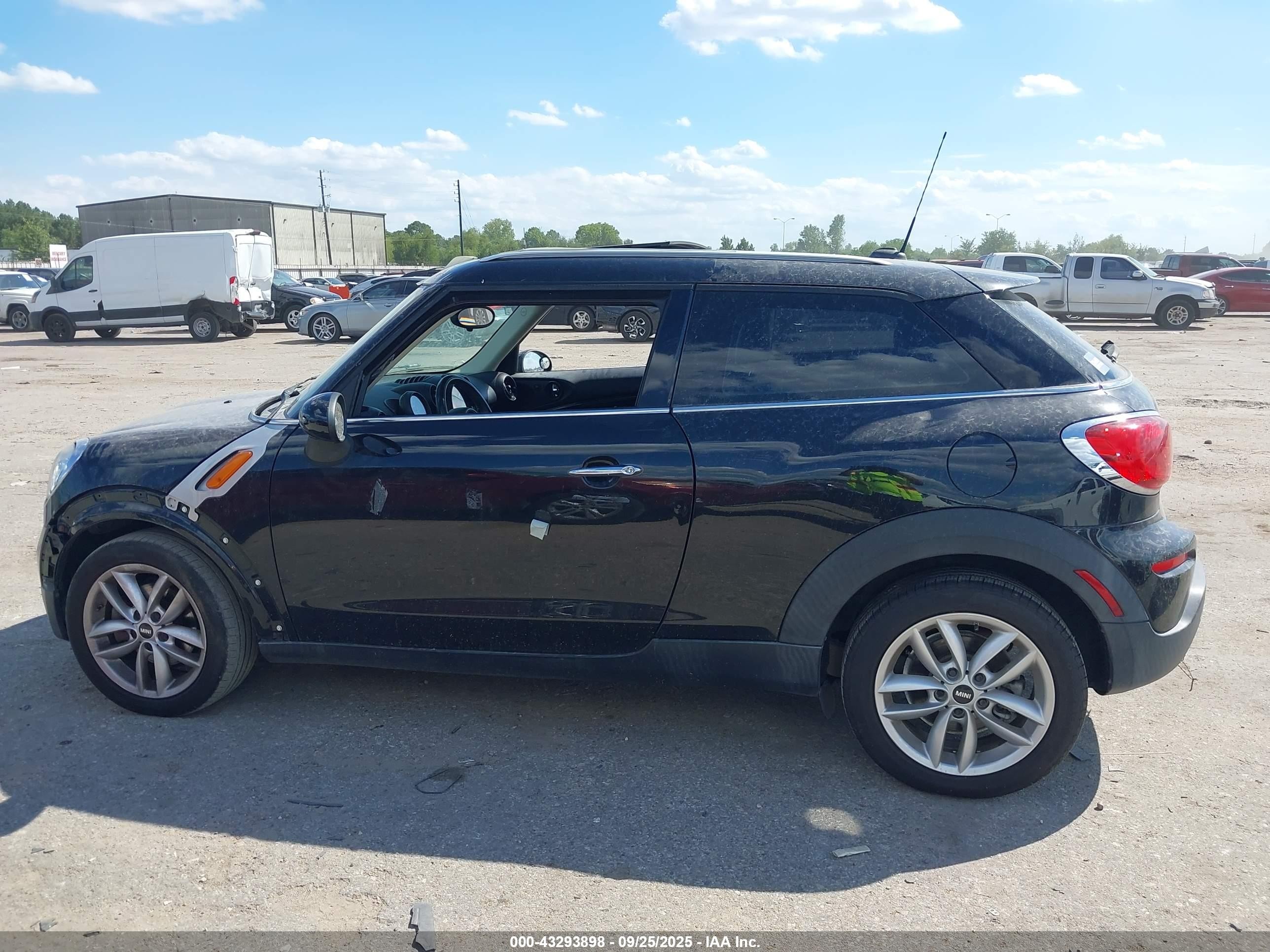 2014 Mini Paceman Cooper Black vin: WMWSS1C51EWN94633
