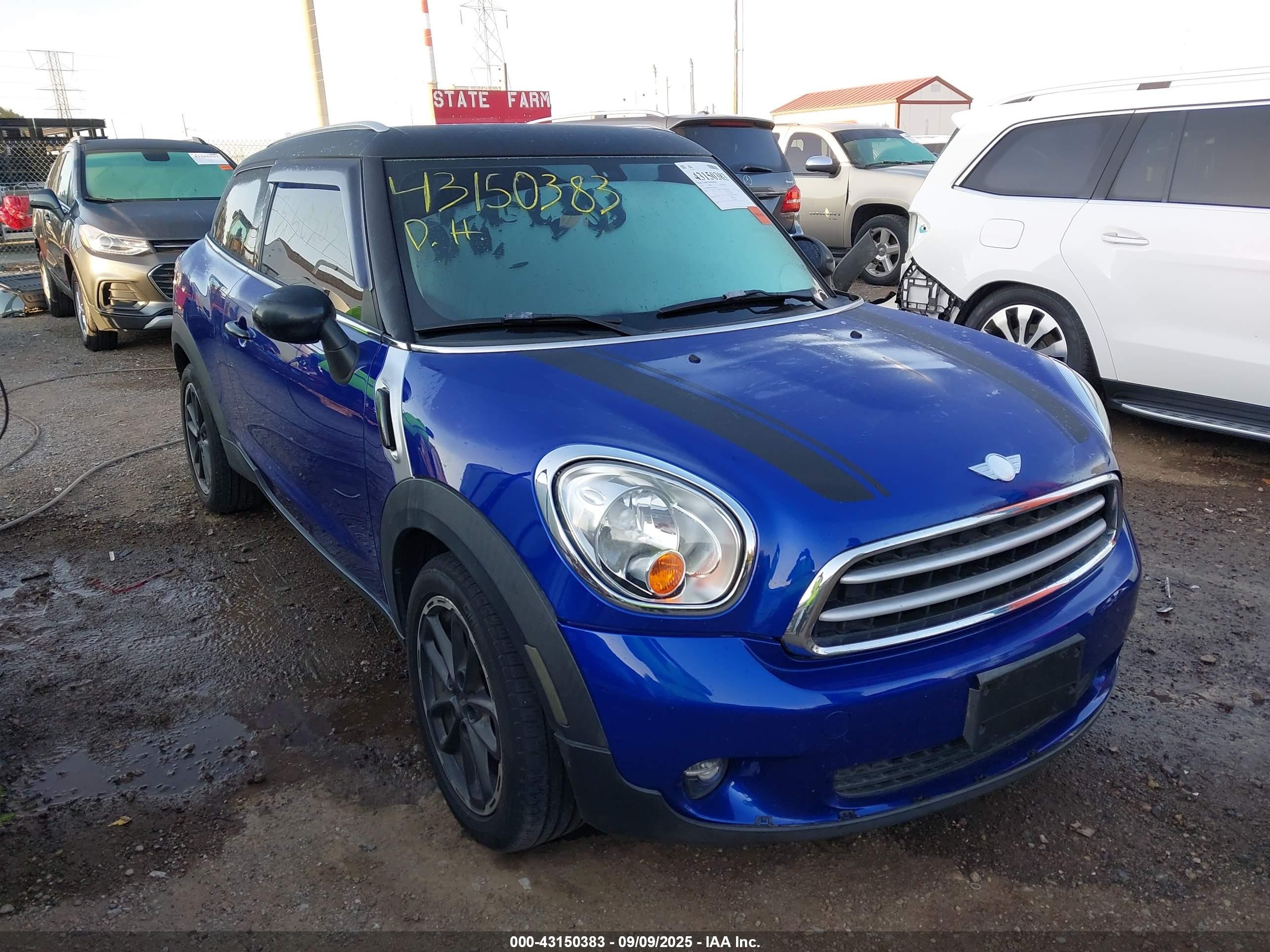 2014 Mini Paceman Cooper Blue vin: WMWSS1C5XEWN94761