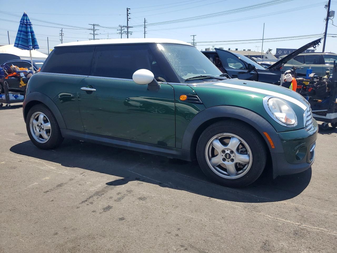 2011 Mini Cooper Green vin: WMWSU3C50BT095129