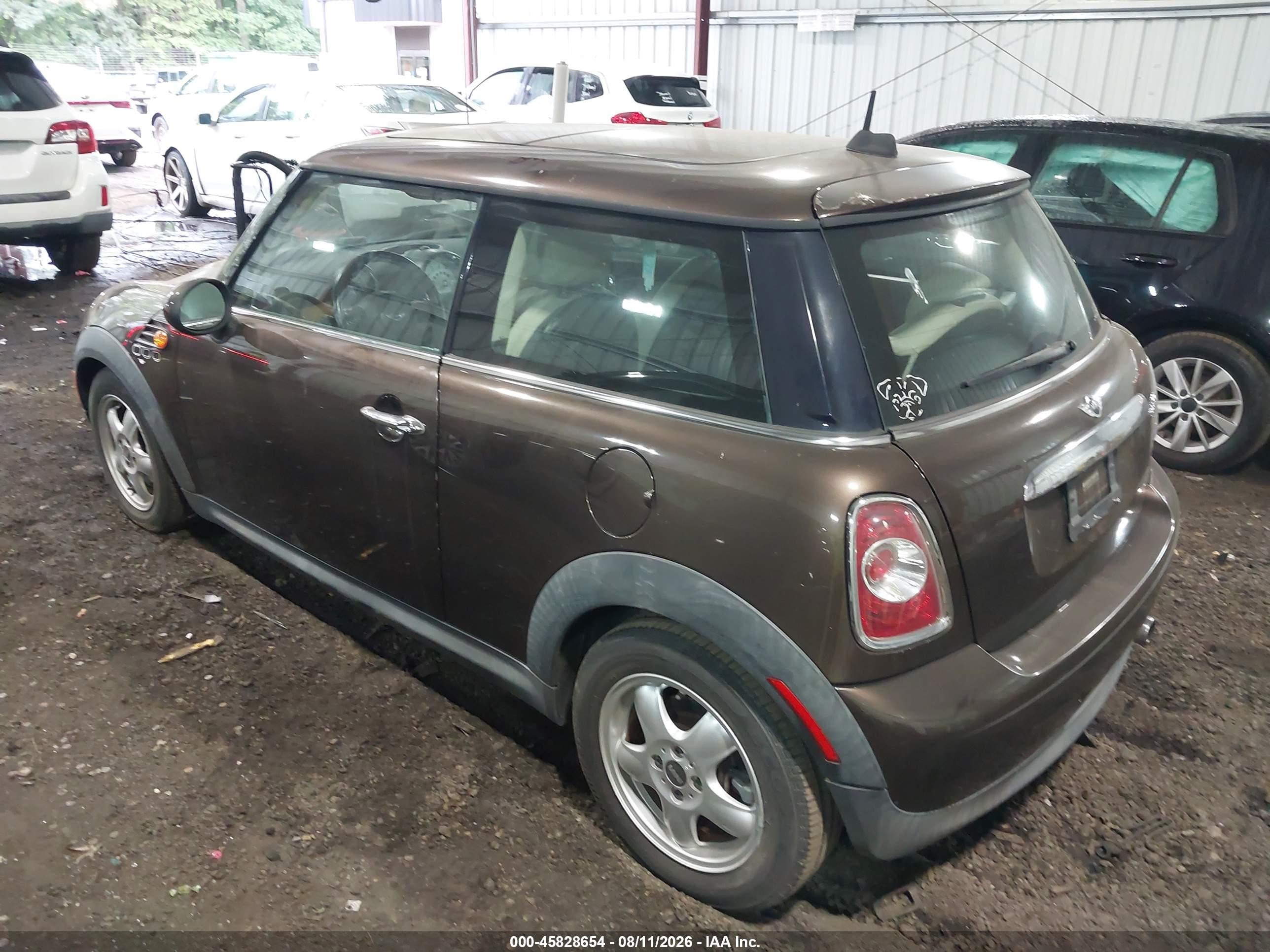 2011 Mini Cooper   Brown vin: WMWSU3C51BTX96441