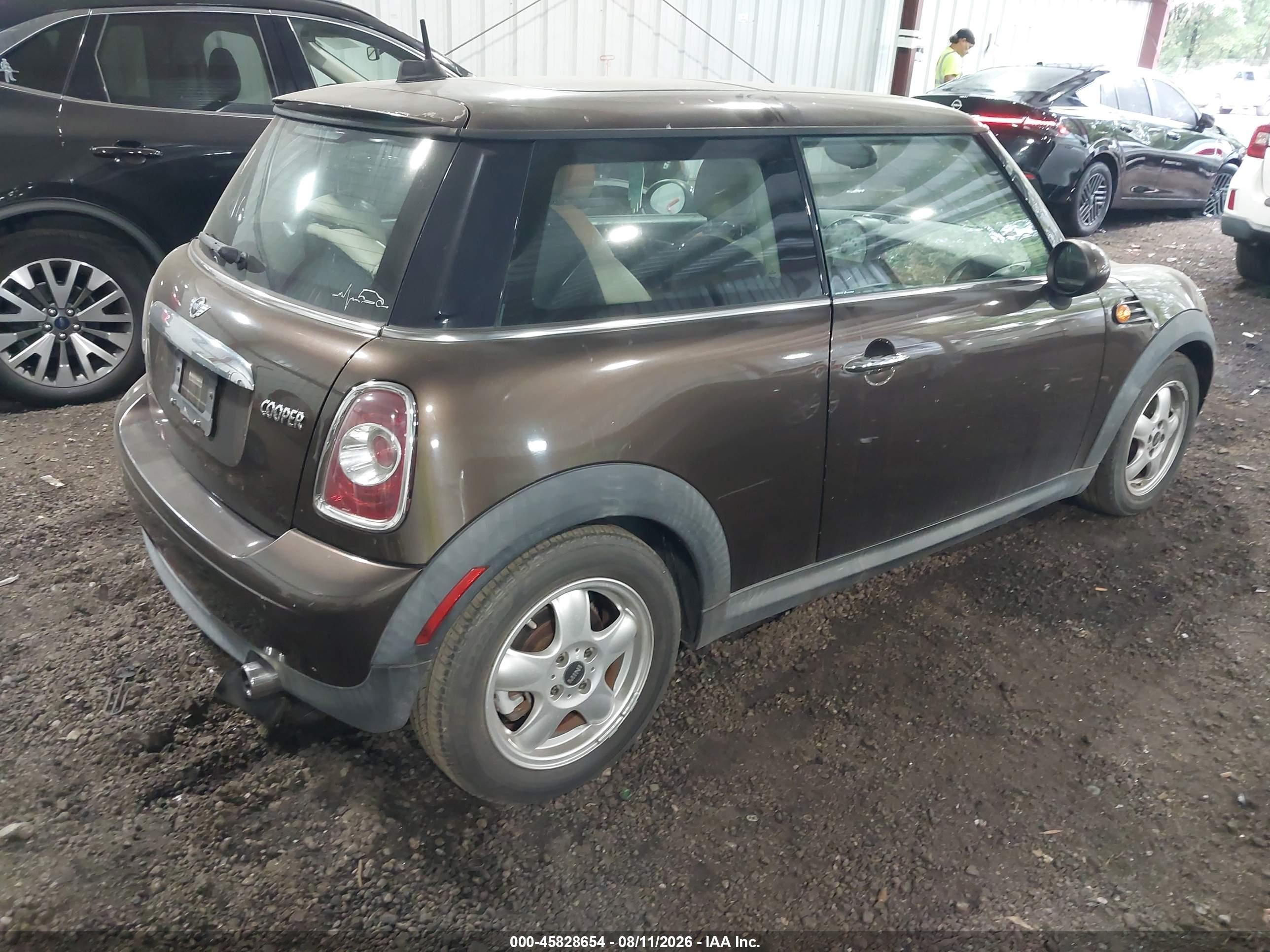 2011 Mini Cooper   Brown vin: WMWSU3C51BTX96441