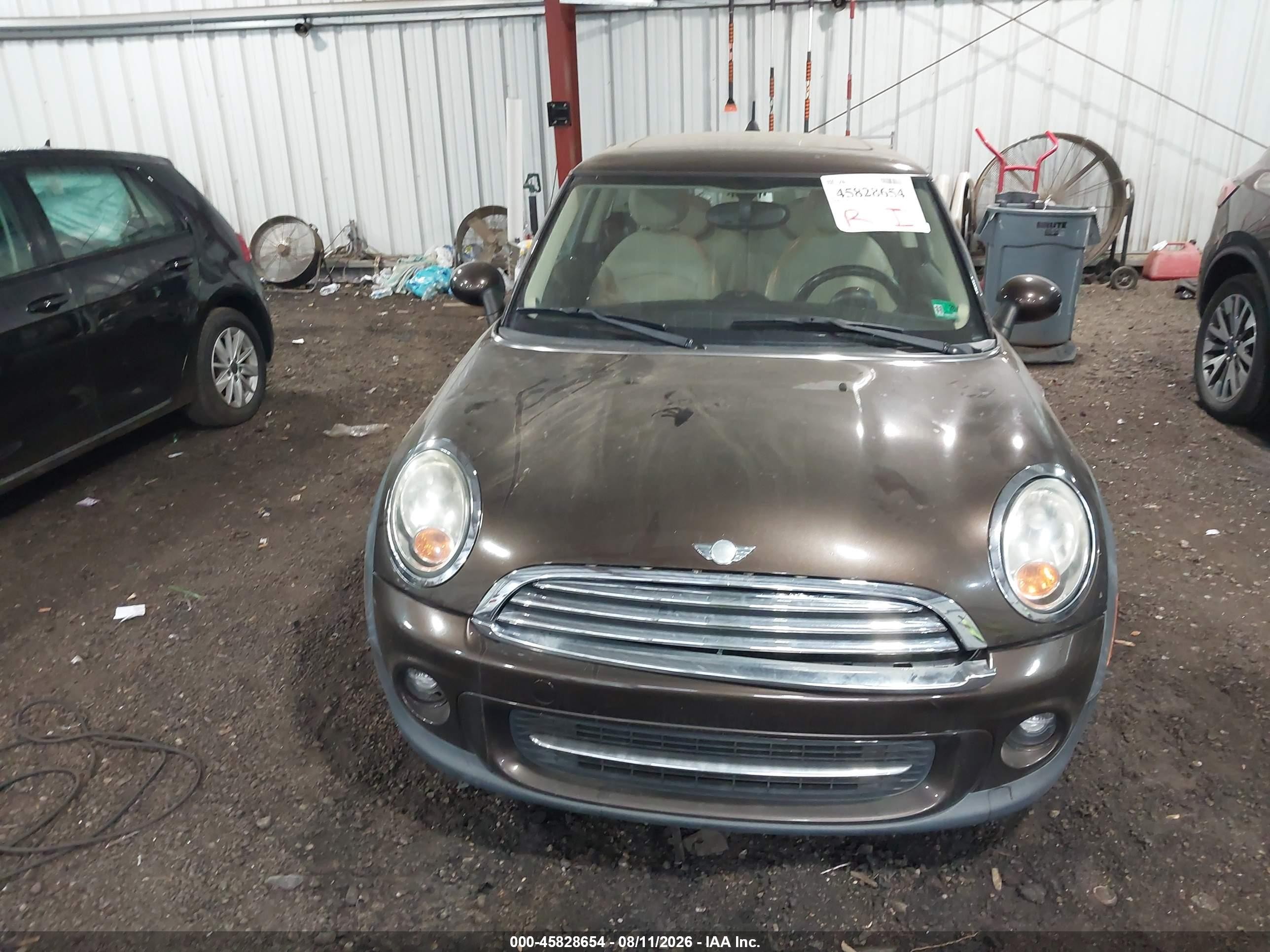 2011 Mini Cooper   Brown vin: WMWSU3C51BTX96441