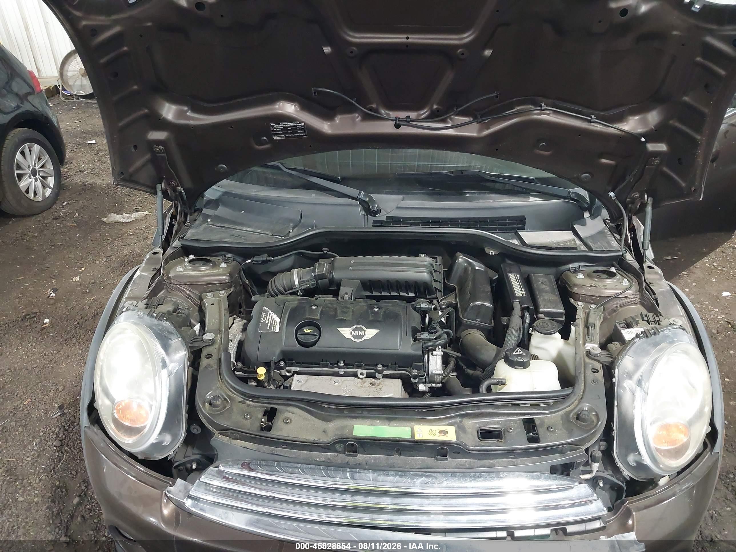 2011 Mini Cooper   Brown vin: WMWSU3C51BTX96441