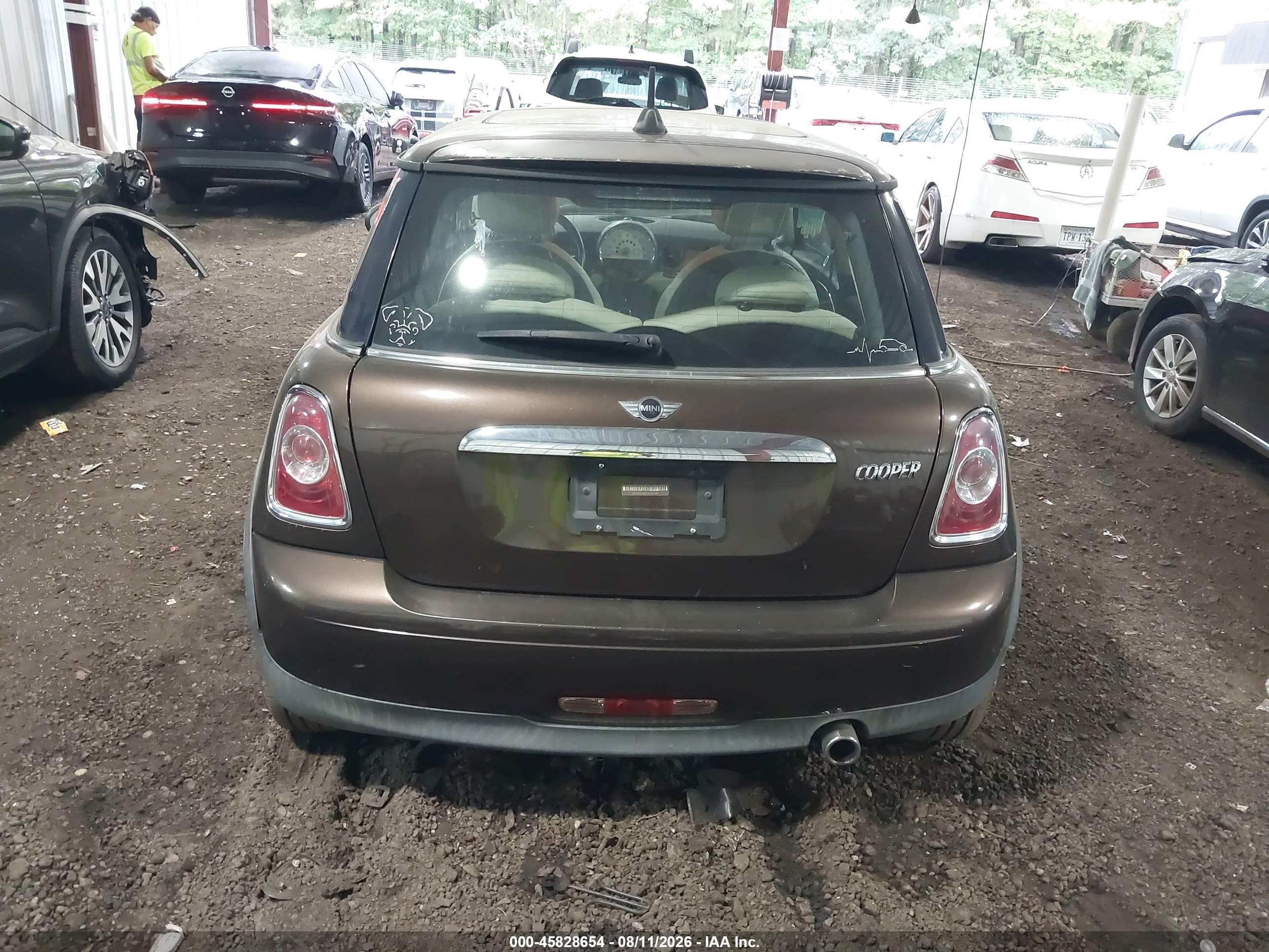 2011 Mini Cooper   Brown vin: WMWSU3C51BTX96441