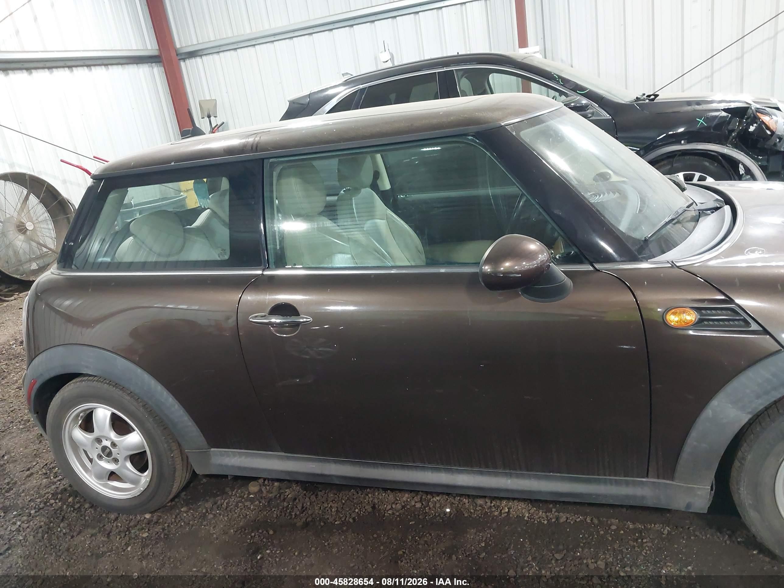 2011 Mini Cooper   Brown vin: WMWSU3C51BTX96441