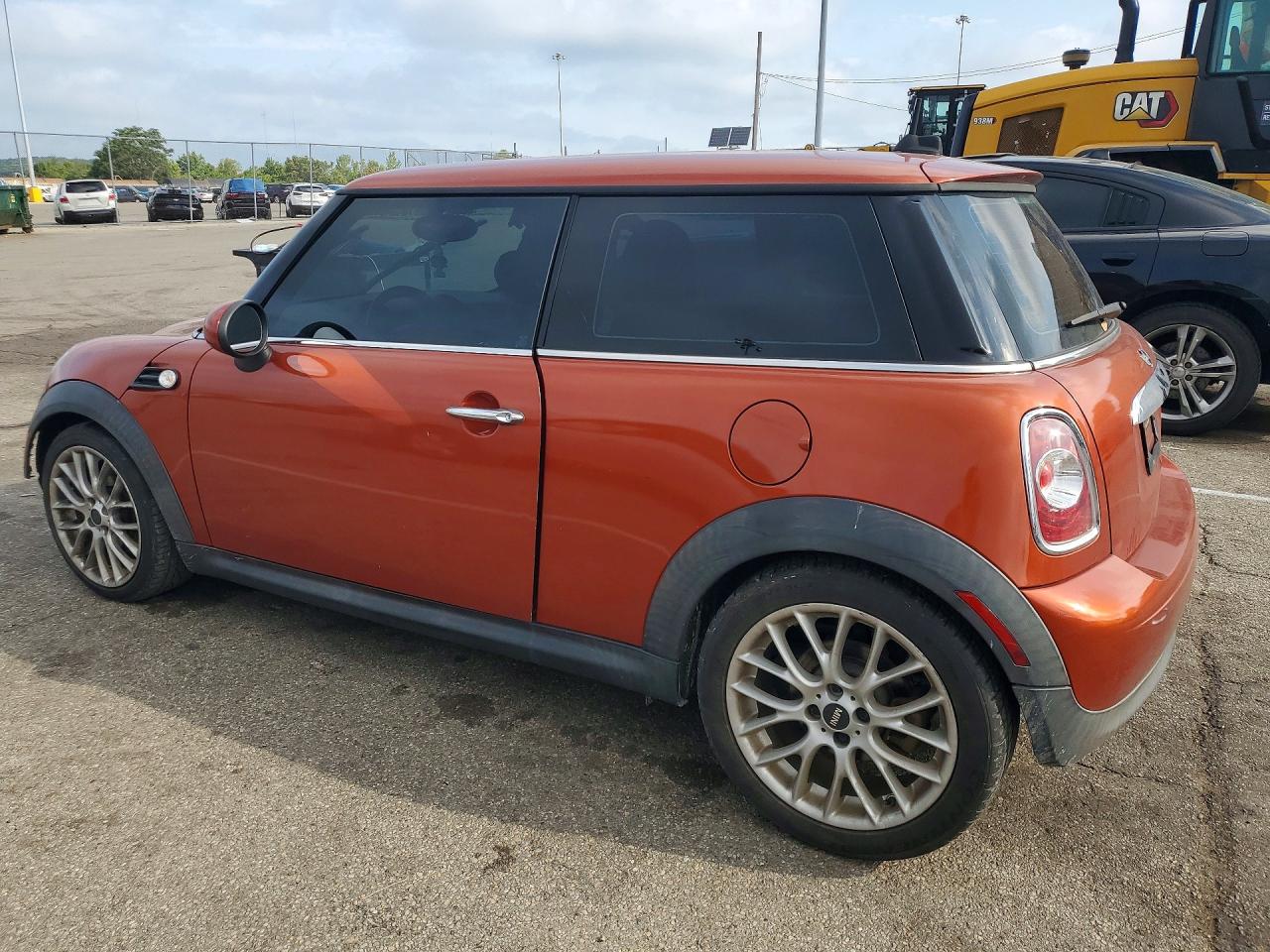 2011 Mini Cooper Orange vin: WMWSU3C53BT095402