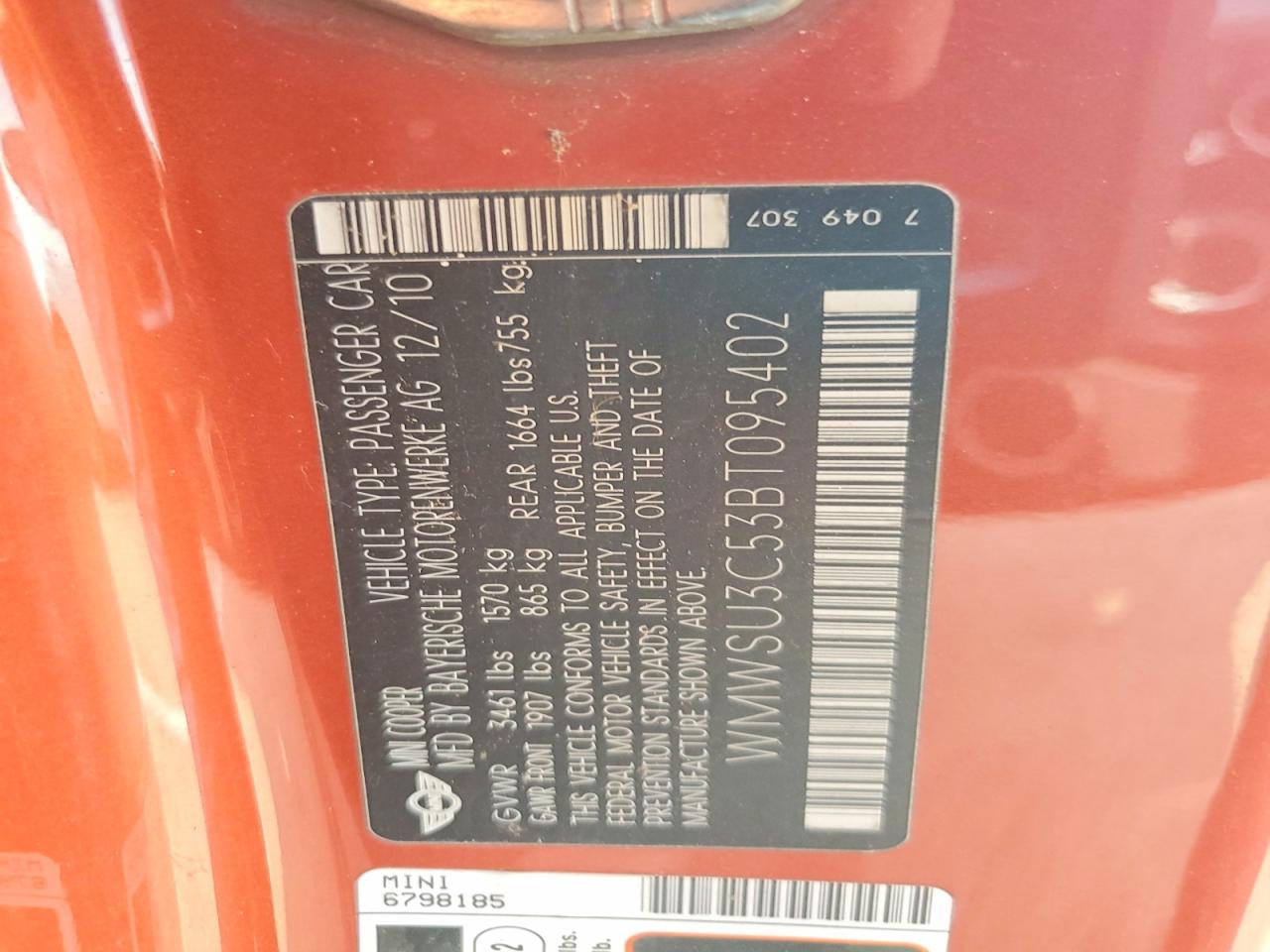 2011 Mini Cooper Orange vin: WMWSU3C53BT095402