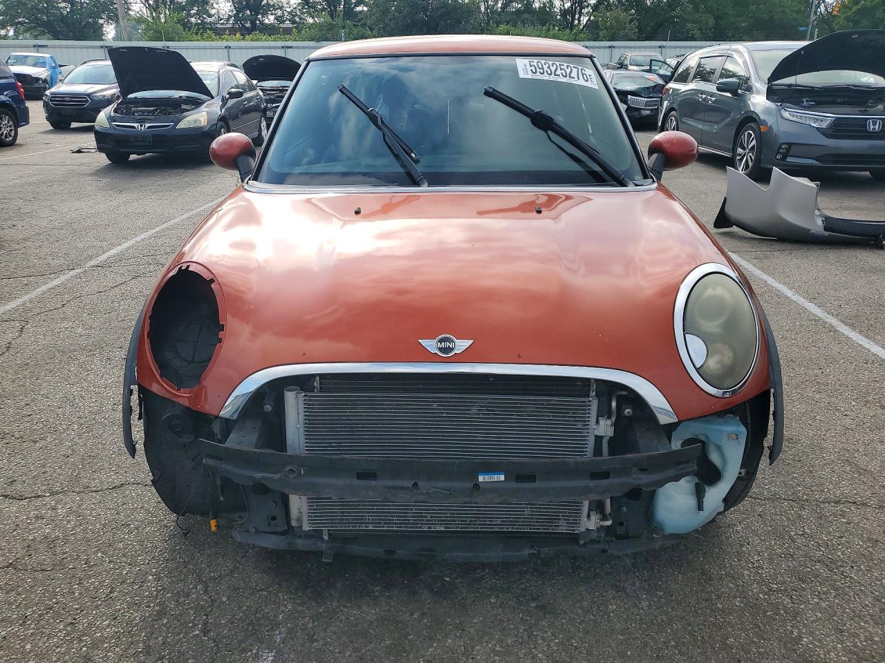 2011 Mini Cooper Orange vin: WMWSU3C53BT095402