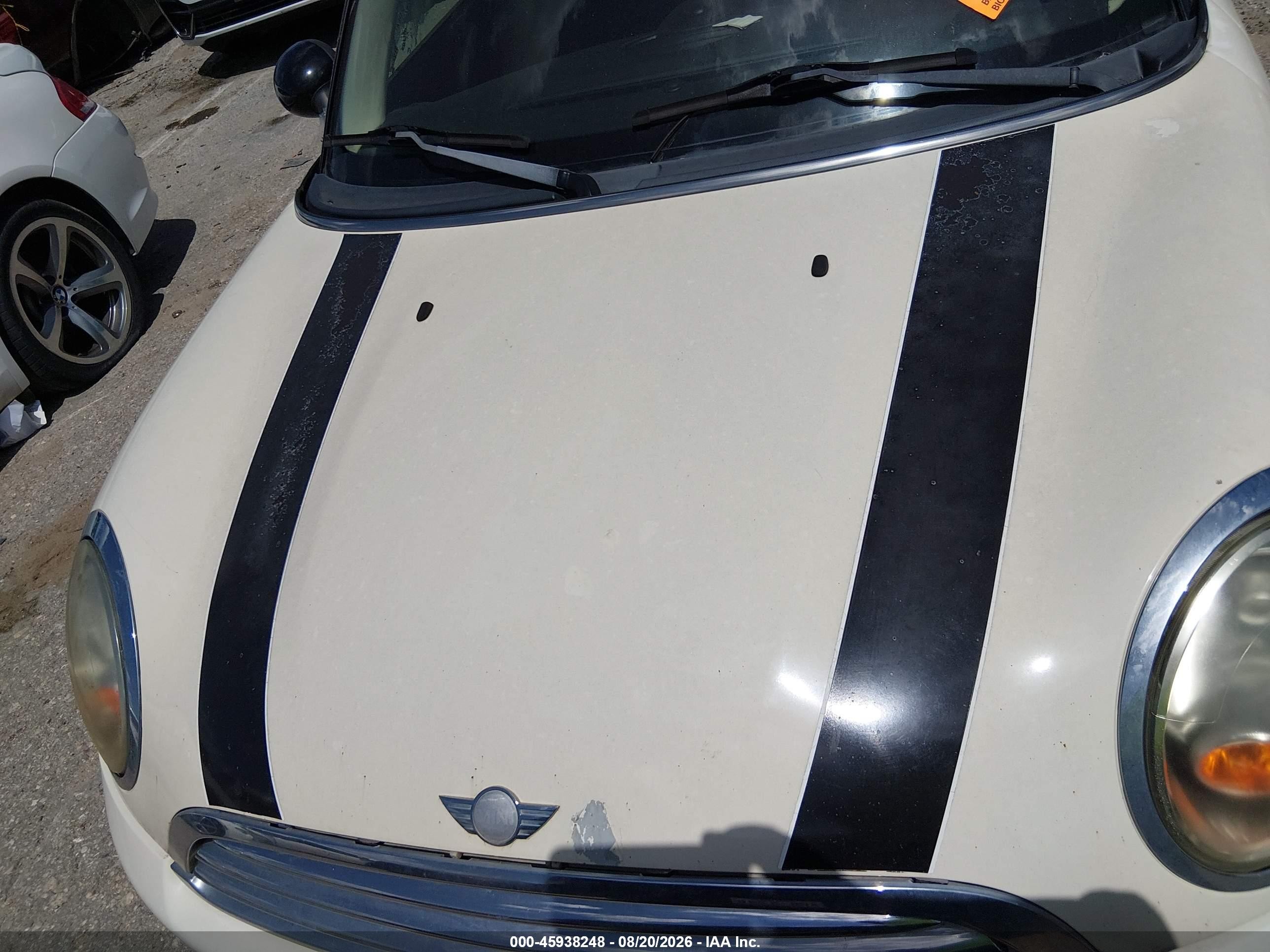 2011 Mini Cooper   White vin: WMWSU3C54BT094002