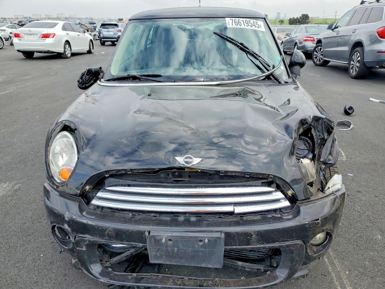 2012 Mini Cooper Black vin: WMWSU3C54CT541574