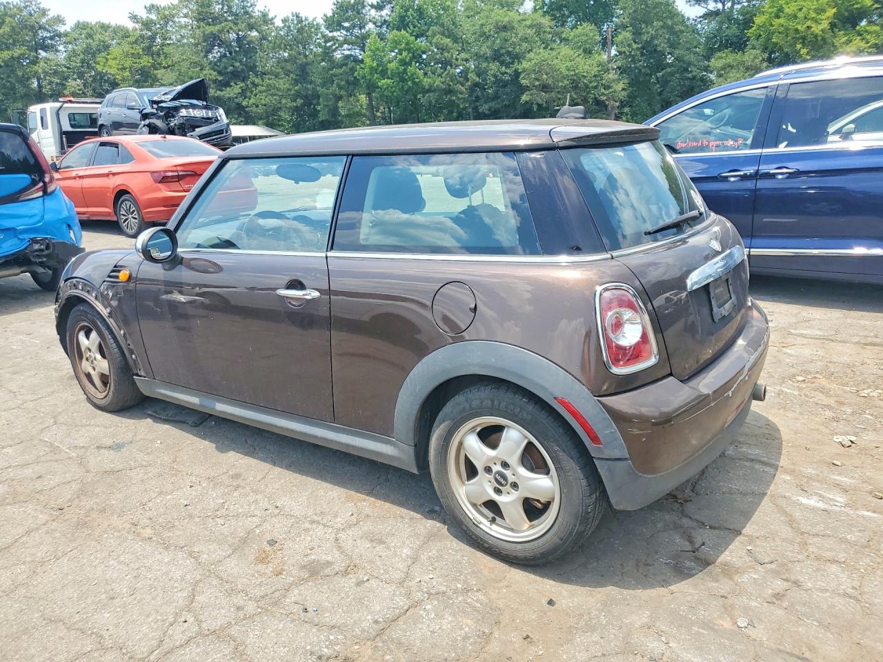 2011 Mini Cooper Brown vin: WMWSU3C56BT092882