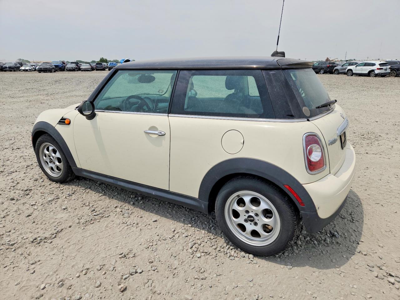 2013 Mini Cooper Cream vin: WMWSU3C57DT679644